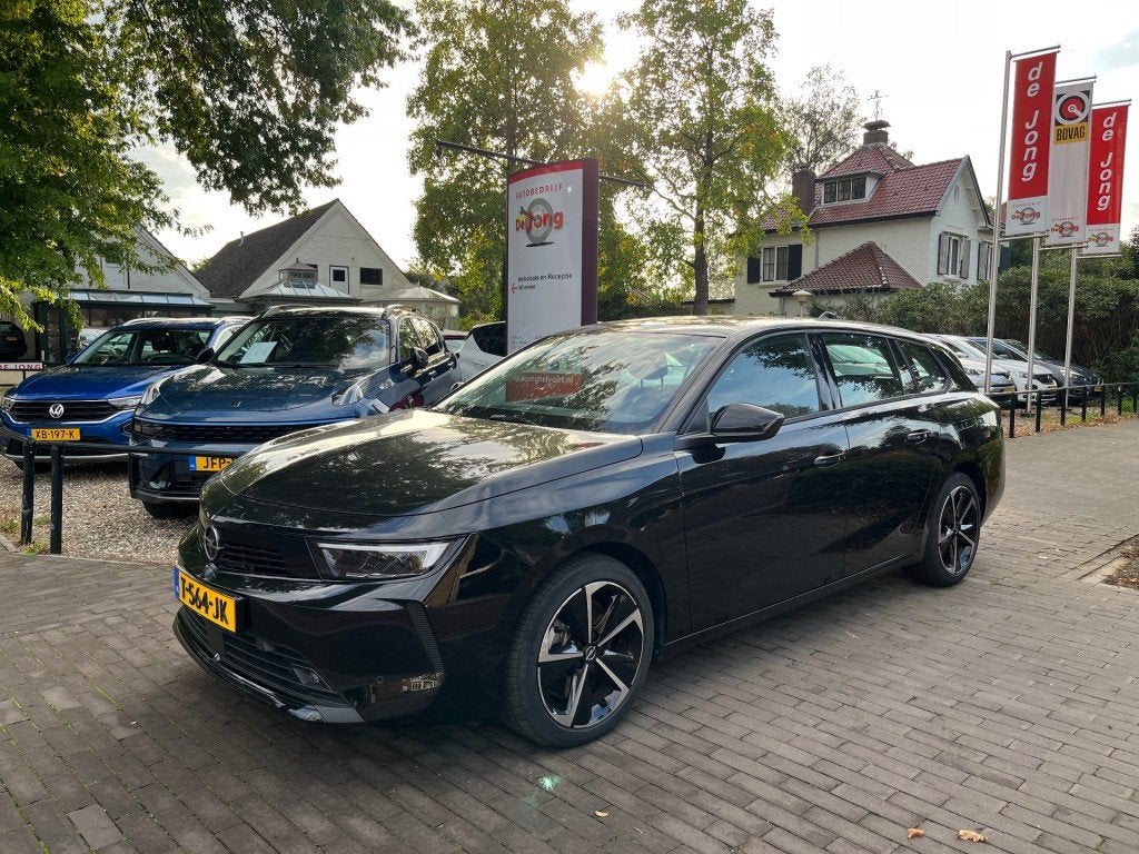 Opel ASTRA SPORTS TOURER 1.6 HYBRID LEVEL 2 PHEV PLUG-IN / T, Auto's, Gebruikt, Euro 6, 4 cilinders, 150 pk