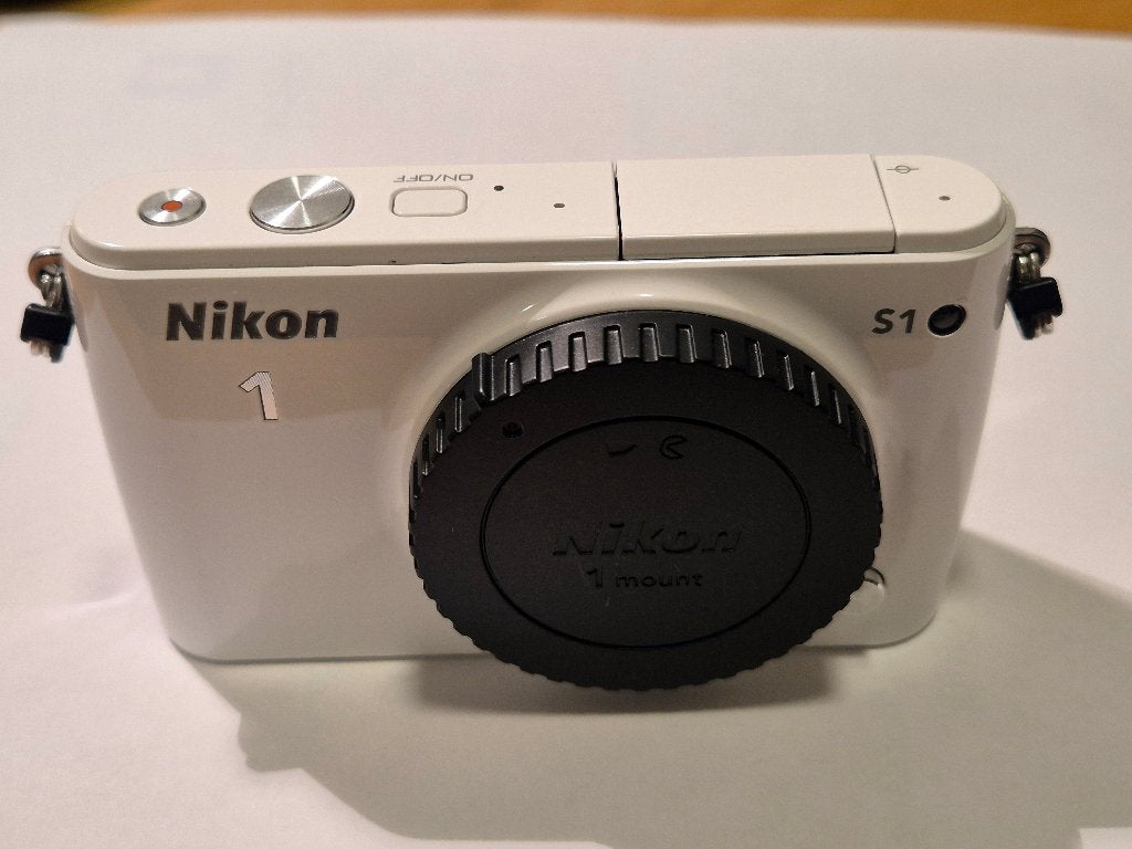 nikon1 S1 digitale camera body, Gebruikt, Accu, 10 megapixels, Ophalen of Verzenden