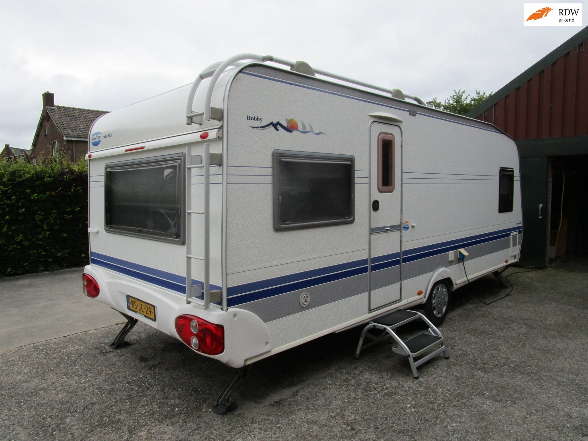 Hobby 24 560 lang breed 250 airco mover voortent tv compleet, Caravans en Kamperen, Hobby, Bedrijf, Airco, 1250 - 1500 kg