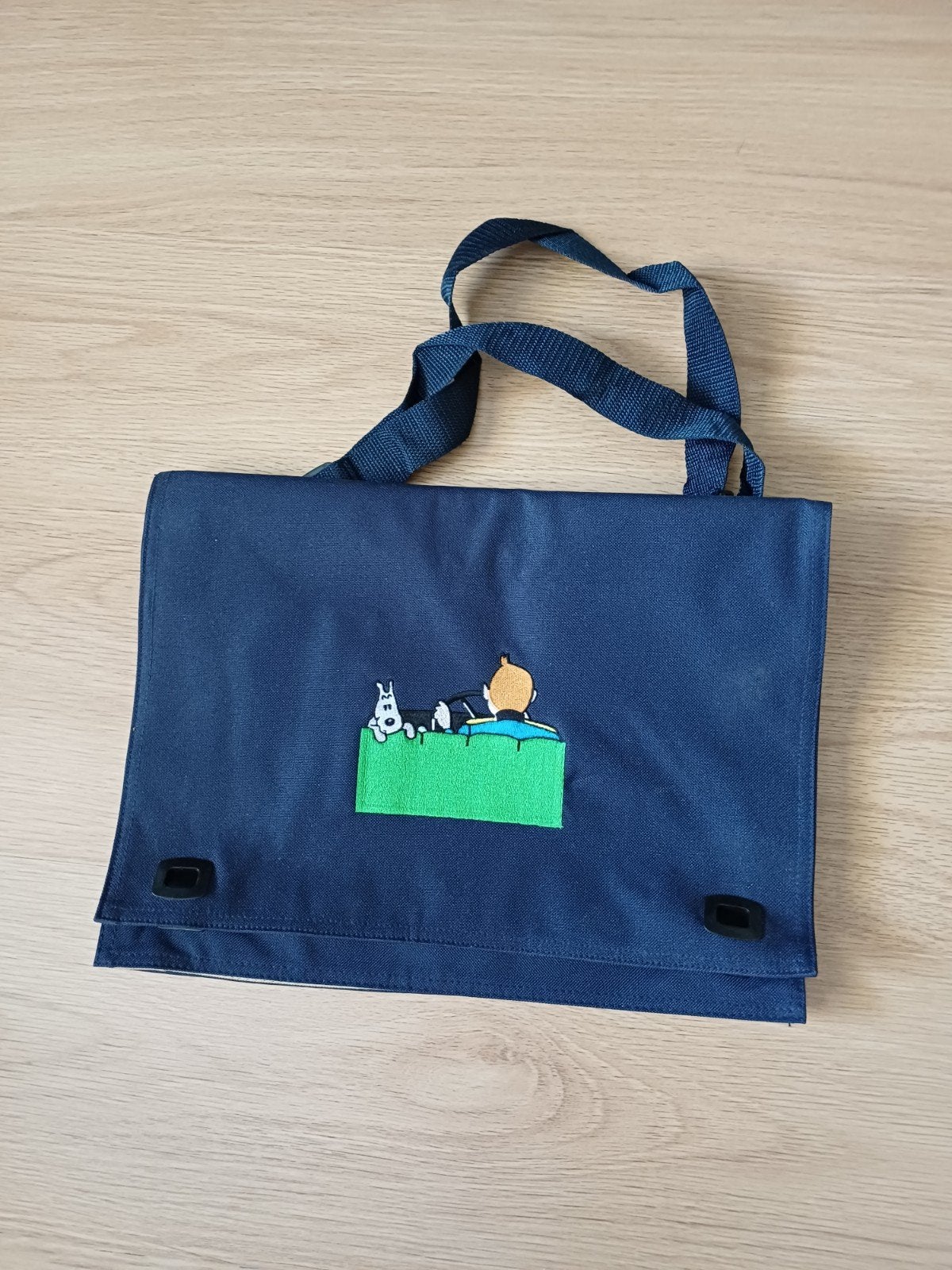 Kuifje tas, Ophalen