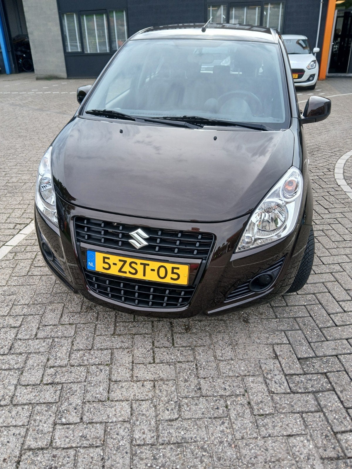 Suzuki Splash 1.2 2015 Bruin, Voorwielaandrijving, 40 €/maand, 4 cilinders, Origineel Nederlands