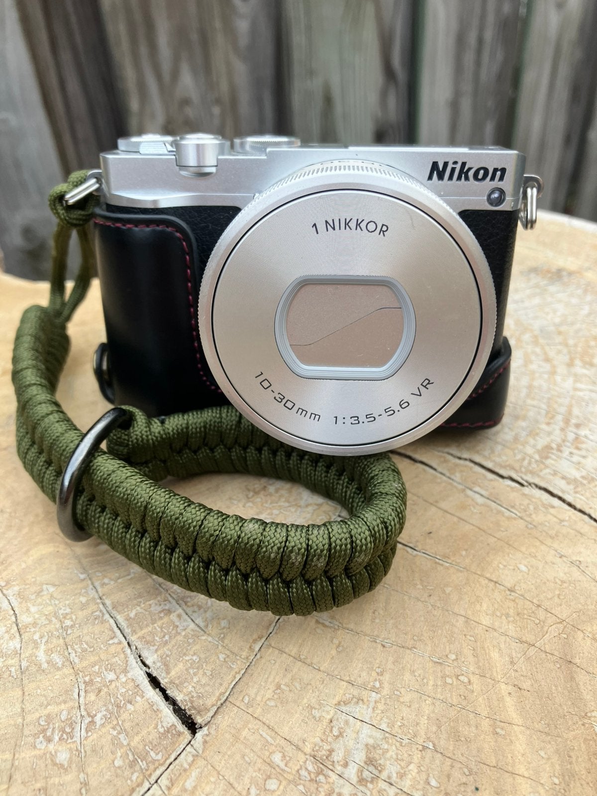 Nikon-1 plus 10-100 lens, Audio, Tv en Foto, Fotocamera's Digitaal, Lensdop, Ophalen of Verzenden, Zo goed als nieuw, Nikon