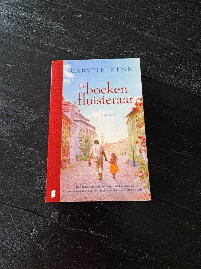 Roman De boekenfluisteraar door Carsten Henn., Boeken, Europa overig, Ophalen of Verzenden, Zo goed als nieuw, Carsten Henn
