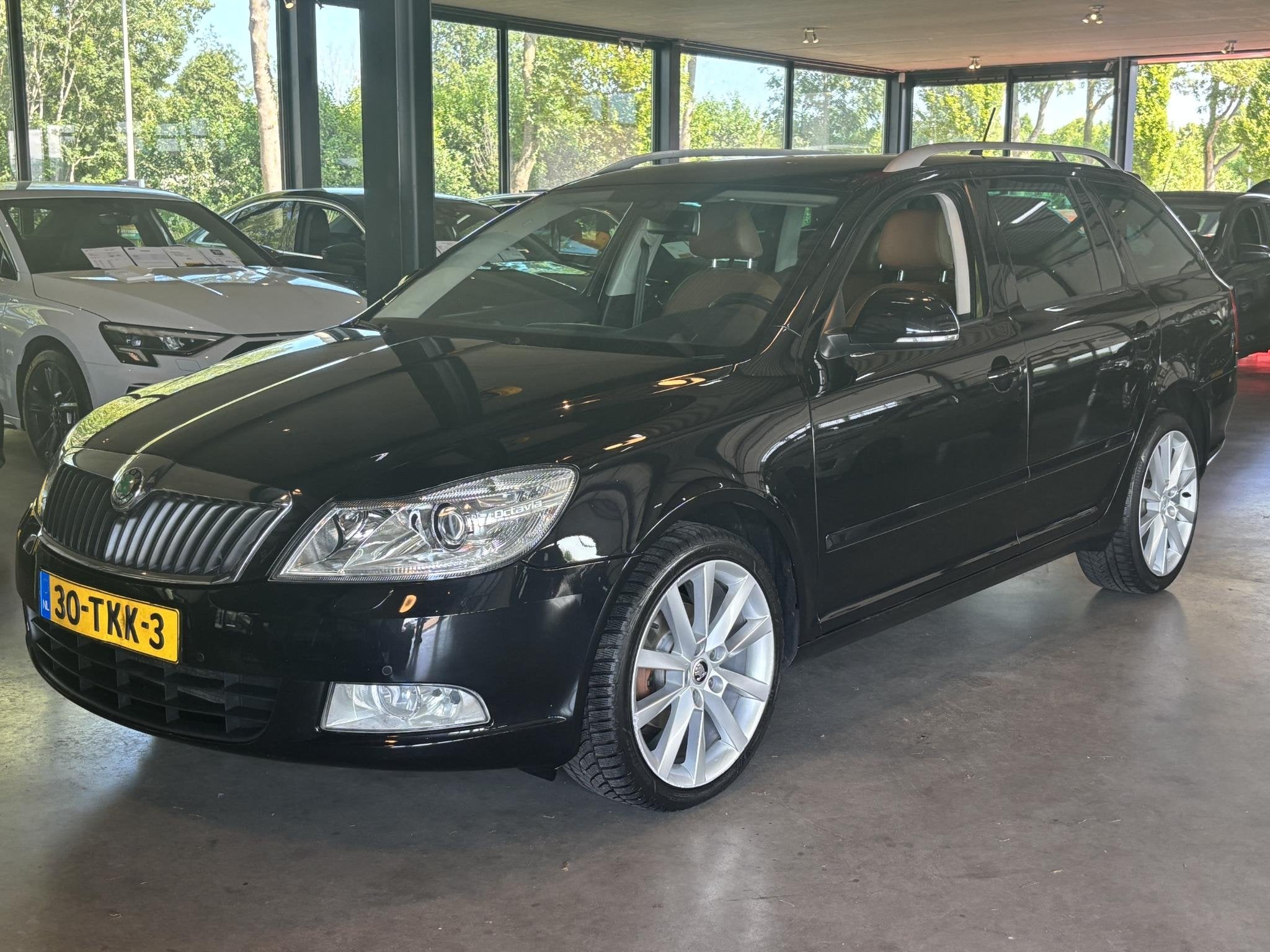 Skoda Octavia Combi 1.2 TSI Elegance Business Line, Auto's, Euro 5, Stof, Gebruikt, 4 cilinders