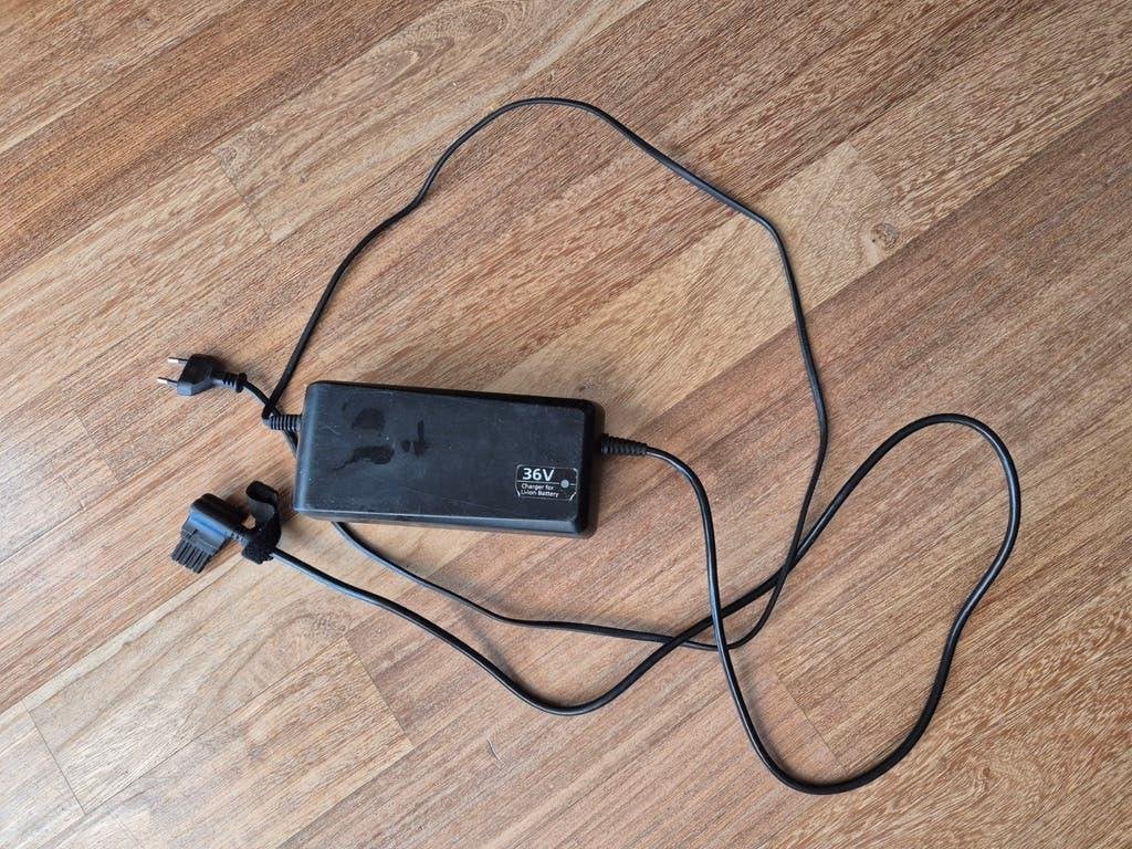 Panasonic acculader voor Gazelle elektrische fiets (NKJ066M), Gebruikt