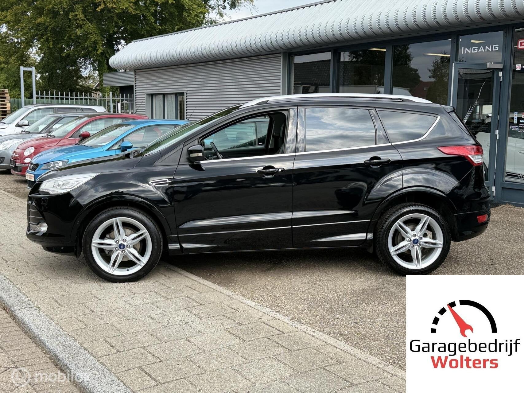Ford Kuga 1.5 EcoBoost Titanium 150pk half leder vol opties, Auto's, Zwart, 4 cilinders, Leder en Stof, Zwart