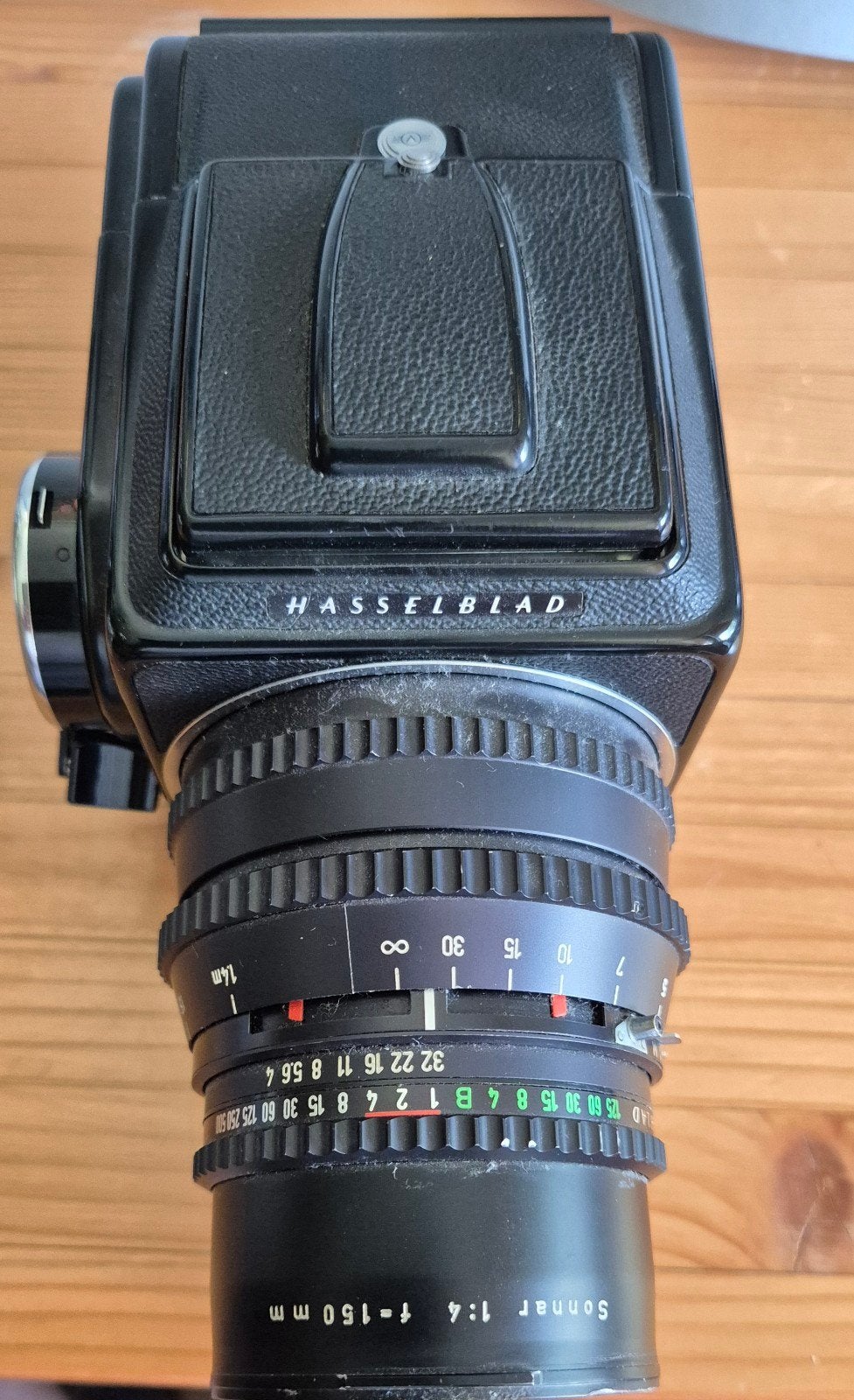 Hasselblad 500C/M met Carl Zeiss Sonnar 150mm f/4 lens, Audio, Tv en Foto, Fotocamera's Analoog, Ophalen of Verzenden, Gebruikt