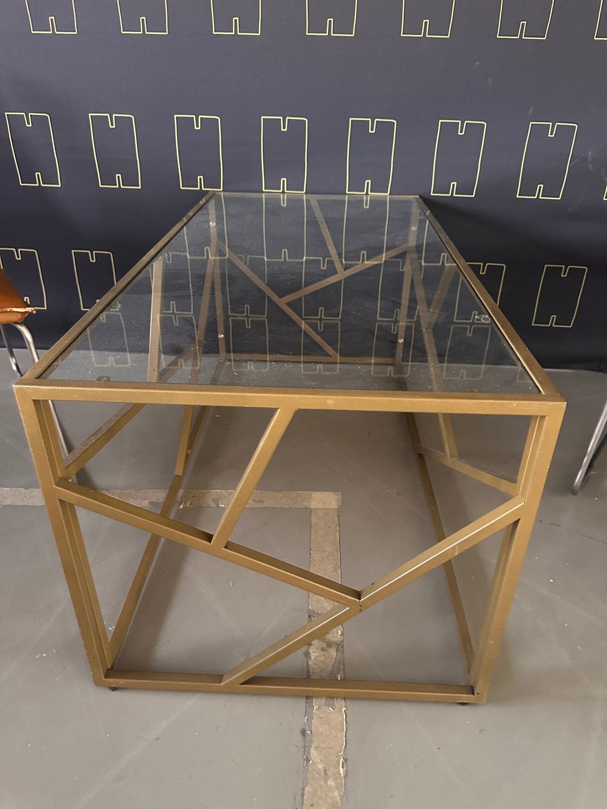 Gouden salontafel met glazen blad, Huis en Inrichting, Tafels | Salontafels, Ophalen, Gebruikt, 100 tot 150 cm, 50 tot 100 cm