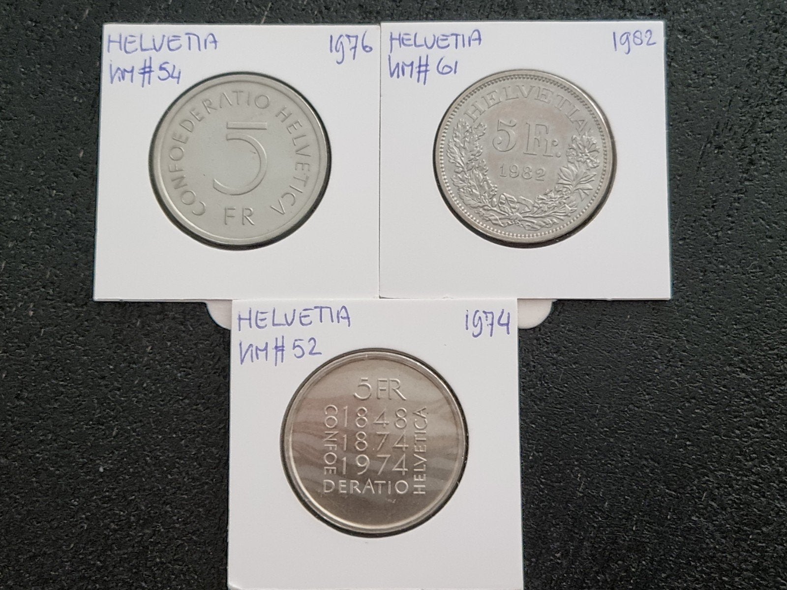Set van 3 Zwitserse 5 Franken munten (1974, 1976, 1982), Postzegels en Munten, Ophalen of Verzenden, Setje