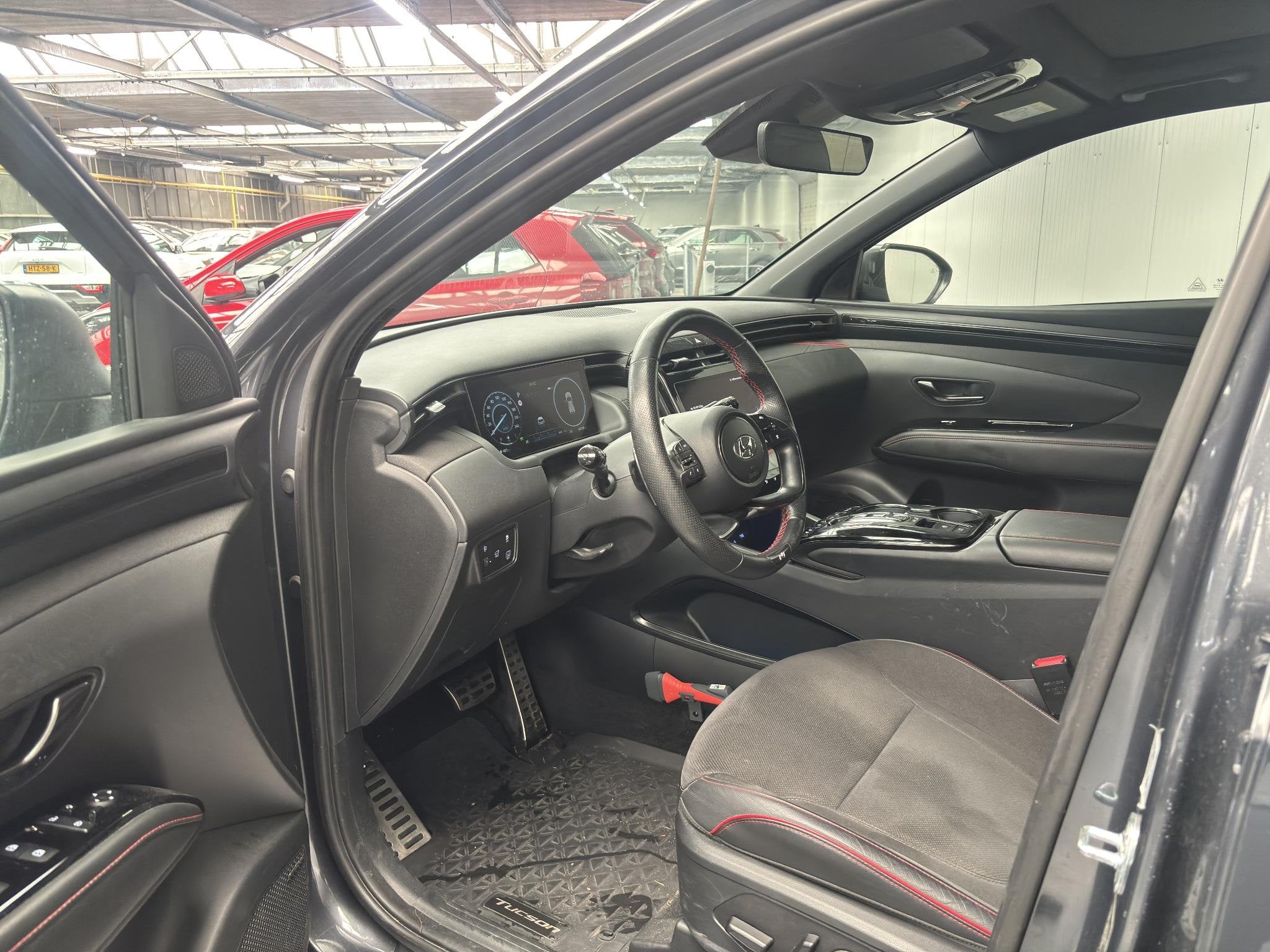 Hyundai Tucson 1.6 T-GDI HEV N Line Sky BOMVOL opties, 1e ei, Auto's, Gebruikt, Euro 6, 4 cilinders, 1650 kg