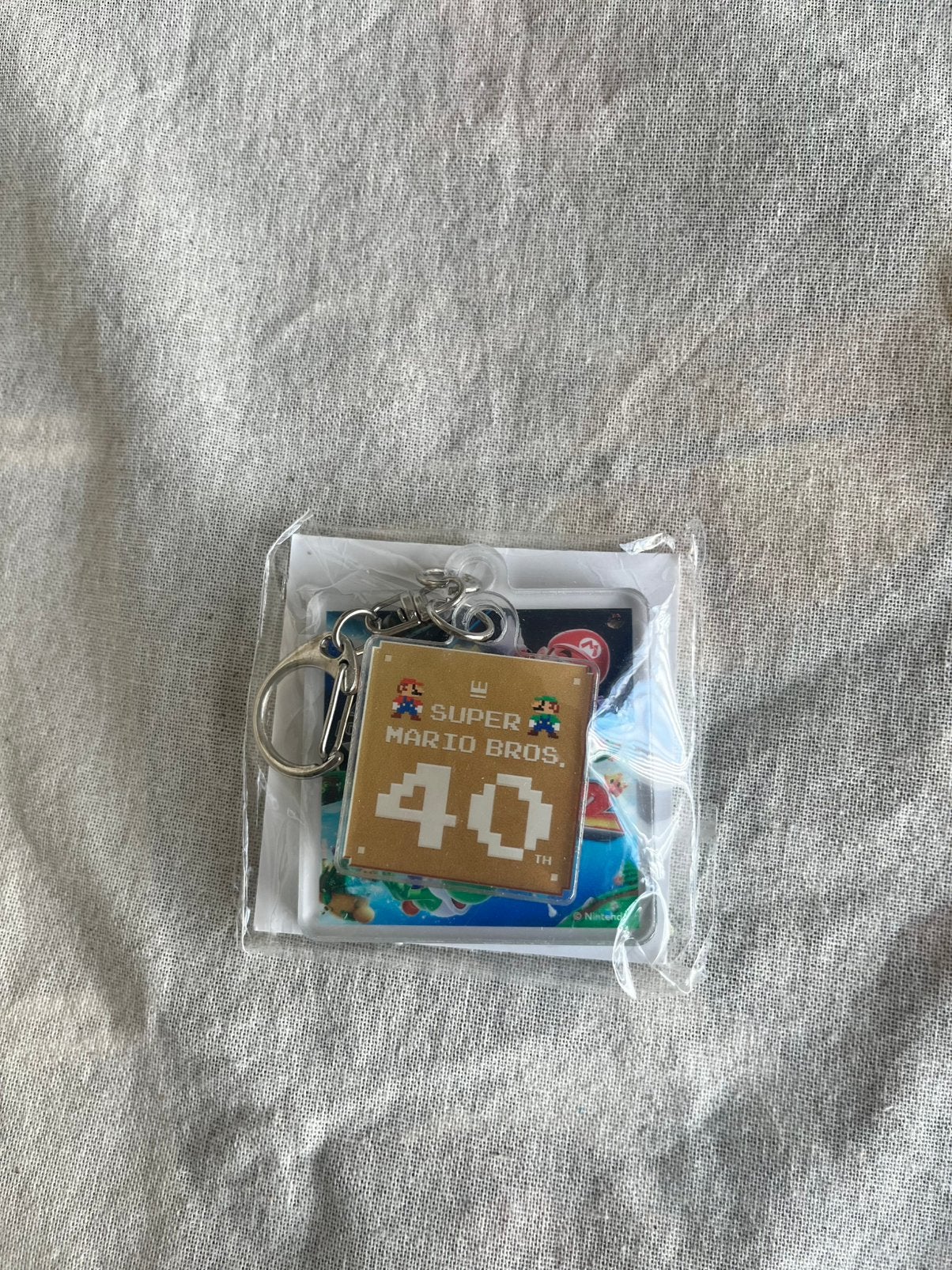 Super Mario Galaxy 40th Anniversary keychain asia exclusive, Spelcomputers en Games, Avontuur en Actie, 1 speler, Nieuw, Ophalen of Verzenden