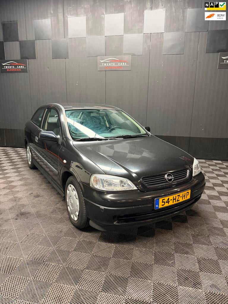 Opel Astra 1.2-16V Coupé | Nieuwe APK |, Auto's, Voorwielaandrijving, 1025 kg, Stof, Zwart