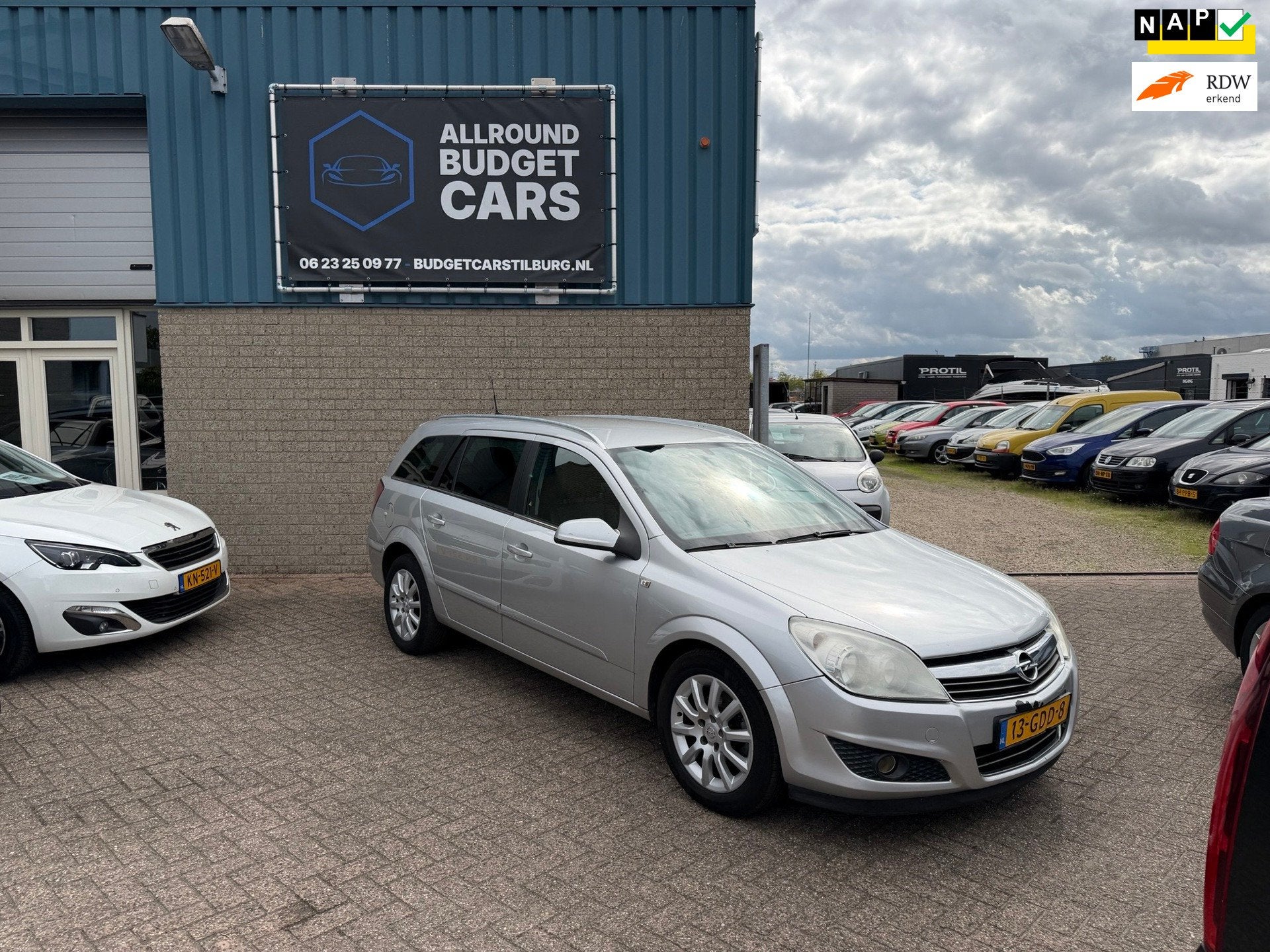 Opel Astra Wagon 1.6 Cosmo, Auto's, Opel, Voorwielaandrijving, 15 km/l, Gebruikt, Zwart