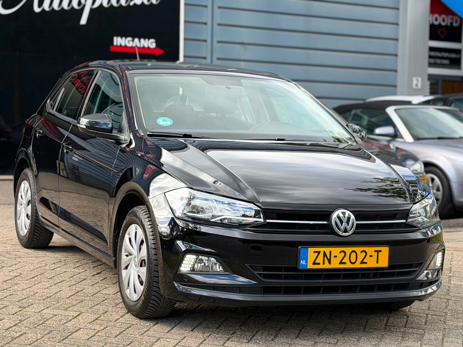 Volkswagen Polo 1.0 TSI Comfortline 5-DEURS CARPLAY/NAVI/CRU, Dealer onderhouden, Stof, Met garantie (alle), Zwart