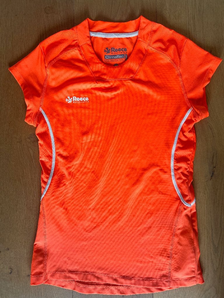 Reece hockeyshirt - oranje - XS, Ophalen of Verzenden, Gebruikt, Kleding