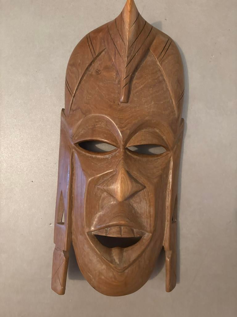 Zelfgemaakt afrikaans masker, Ophalen