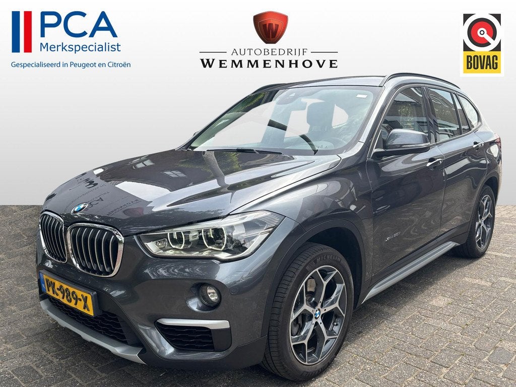 BMW X1 xDrive20i Centennial High Executive (bj 2016), Auto's, BMW, Automatische klimaatregeling, Gebruikt, Leder en Stof, Bedrijf
