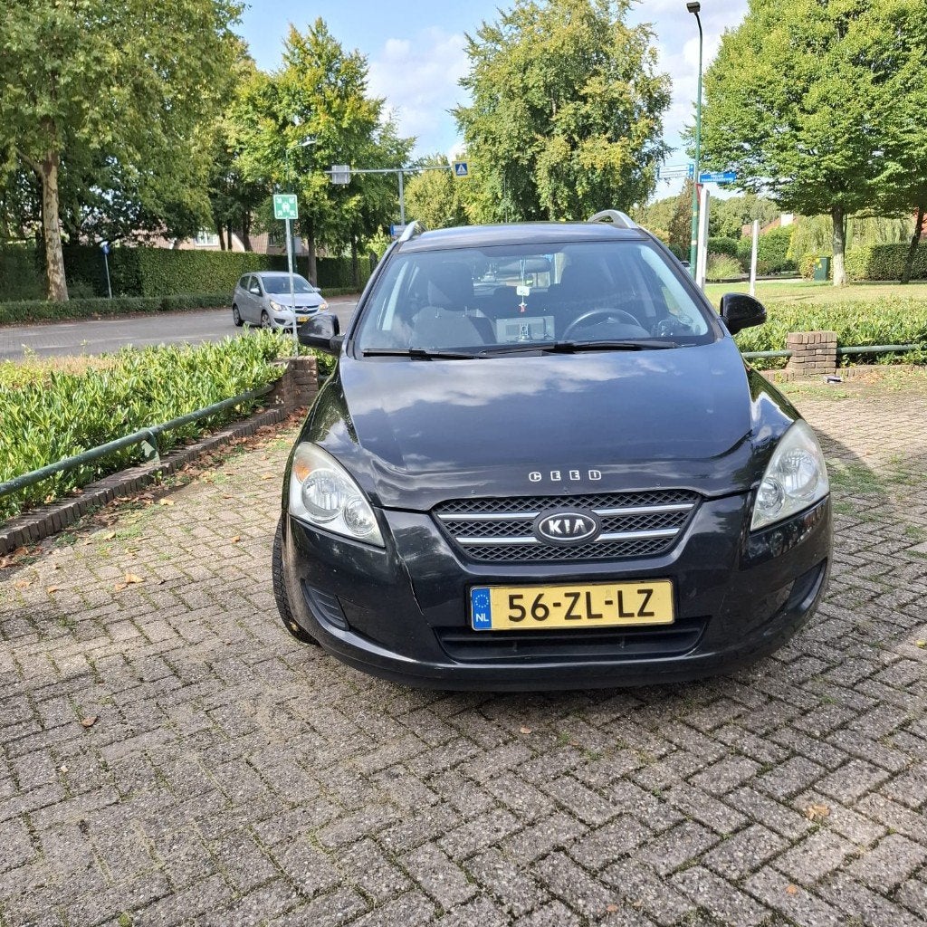 Kia (Pro) Cee d 1.4 Sporty Wagon 2008 Zwart, Auto's, Voorwielaandrijving, Euro 5, 1396 cc, Zwart
