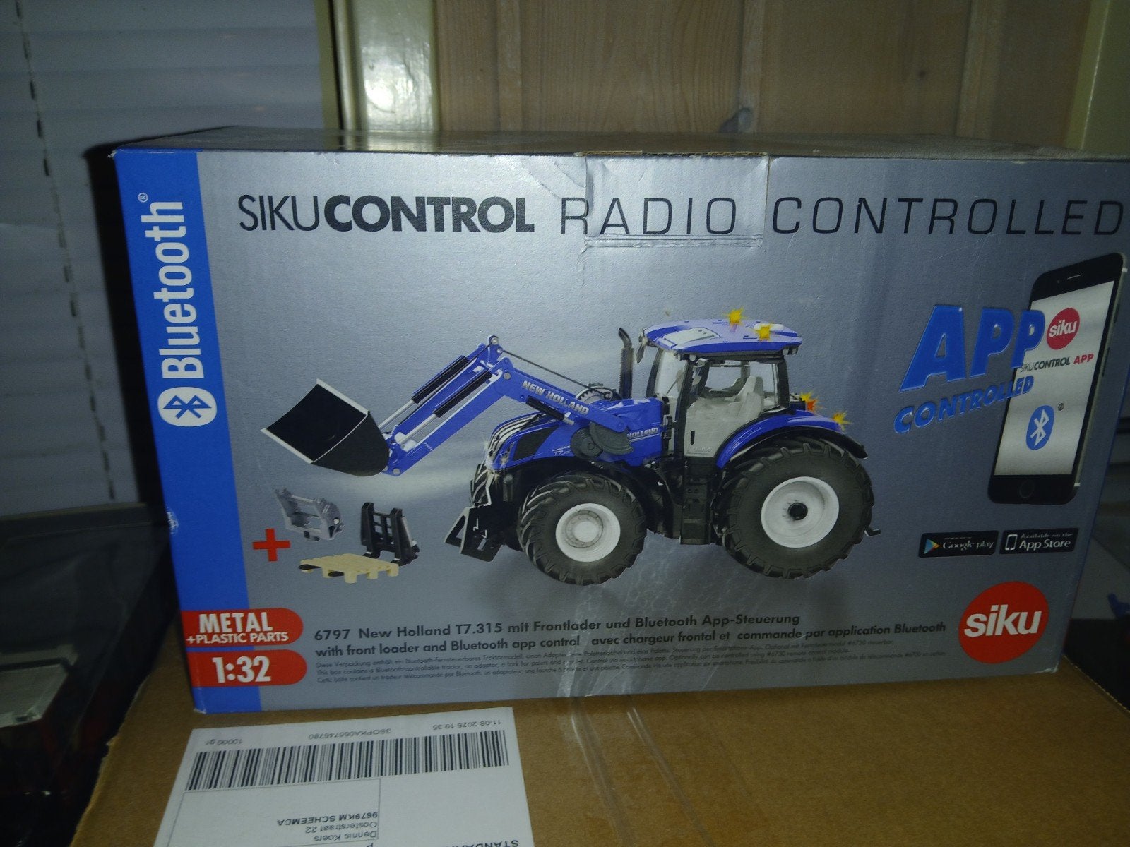T.k. New Holland T7.315 siku control met voorlader., Ophalen of Verzenden