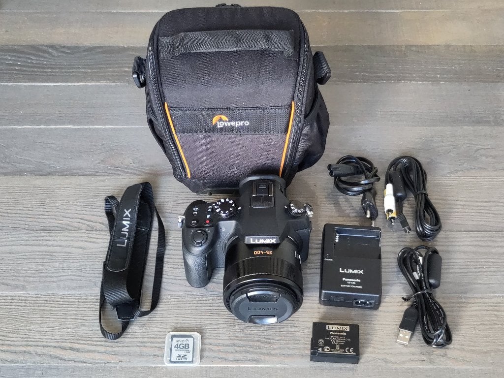 Panasonic Lumix FZ1000 uiterlijk in nieuwstaat met defect, Panasonic, Ophalen of Verzenden, Zo goed als nieuw, Kantelbaar/draaibaar scherm