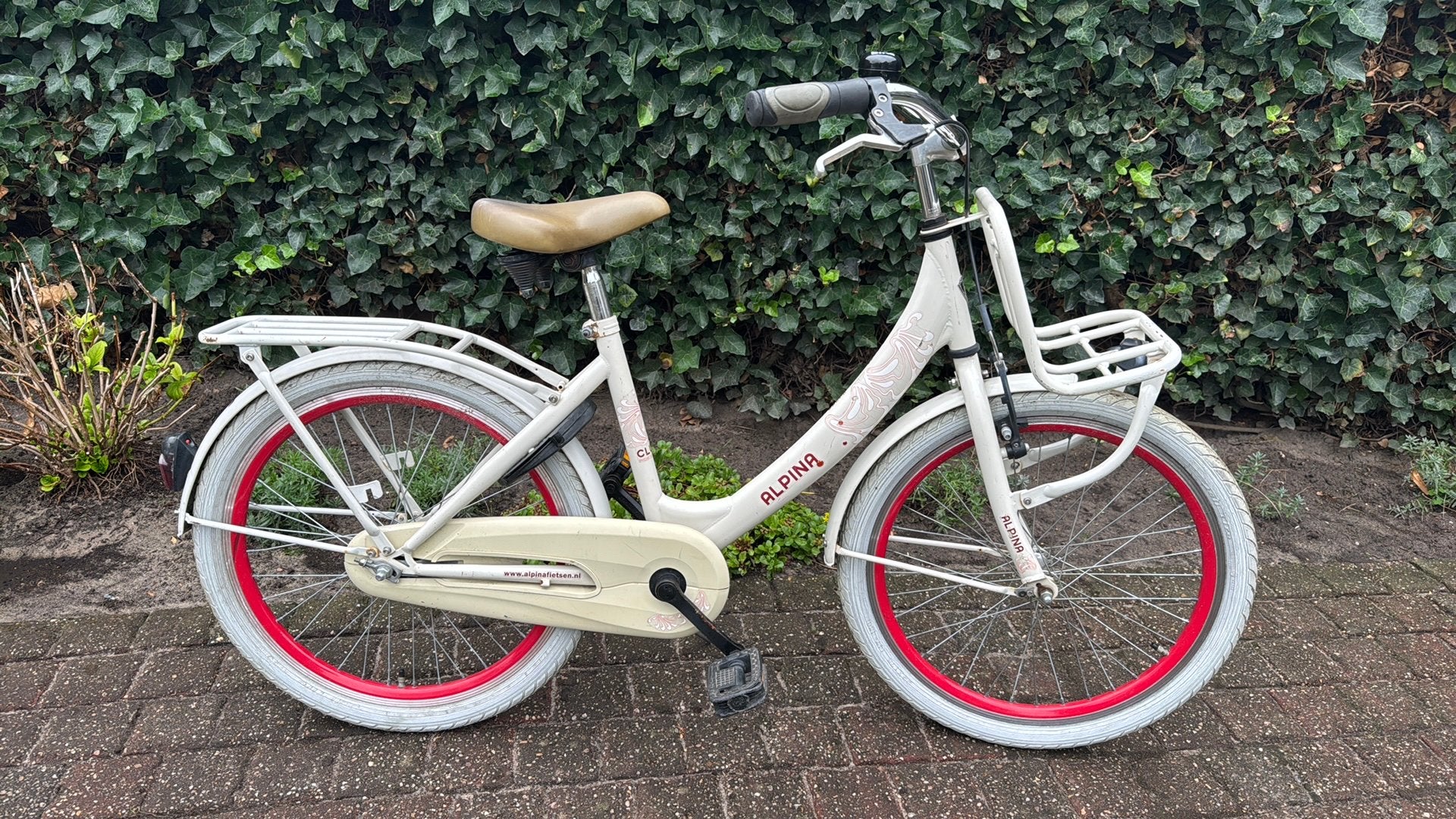22 inch Alpina Meisjesfiets, Ophalen of Verzenden, Gebruikt, 22 inch, Handrem
