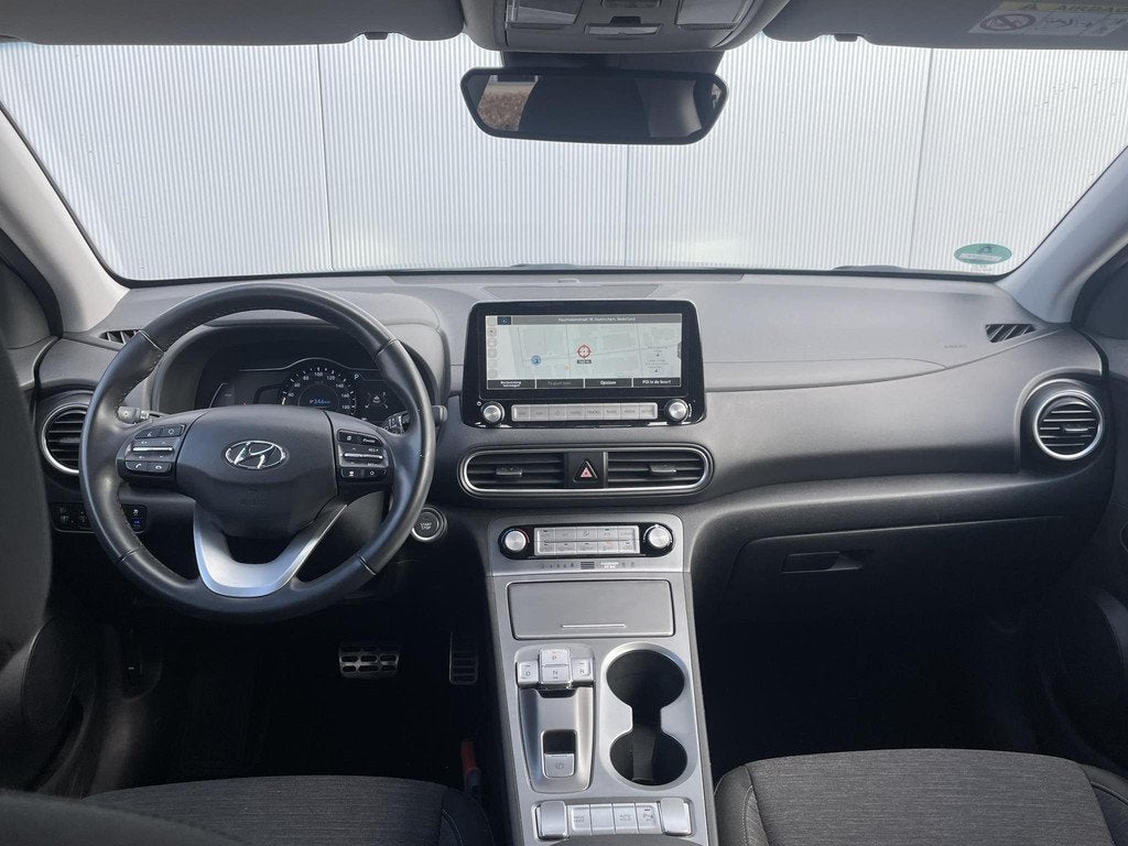 Hyundai Kona EV Fashion 64 kWh / 3 Fase Lader / Cruise Contr, Auto's, Hyundai, Stof, Gebruikt, Origineel Nederlands, Automatische klimaatregeling