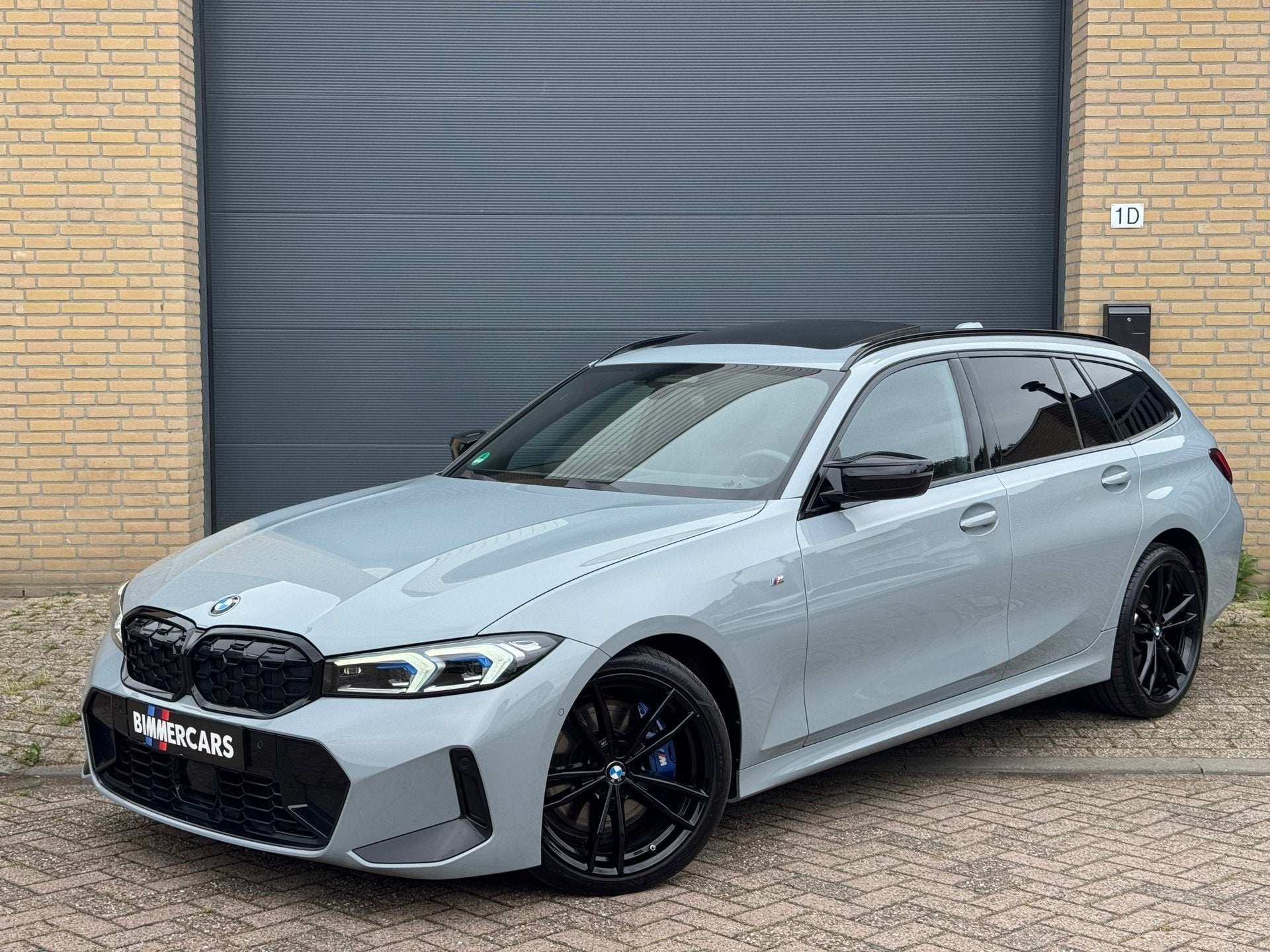 BMW 3-serie Touring M340i xDrive LCI Brooklyn Grijs|Pano|HK|, Automaat, Gebruikt, Zwart, 2993 cc