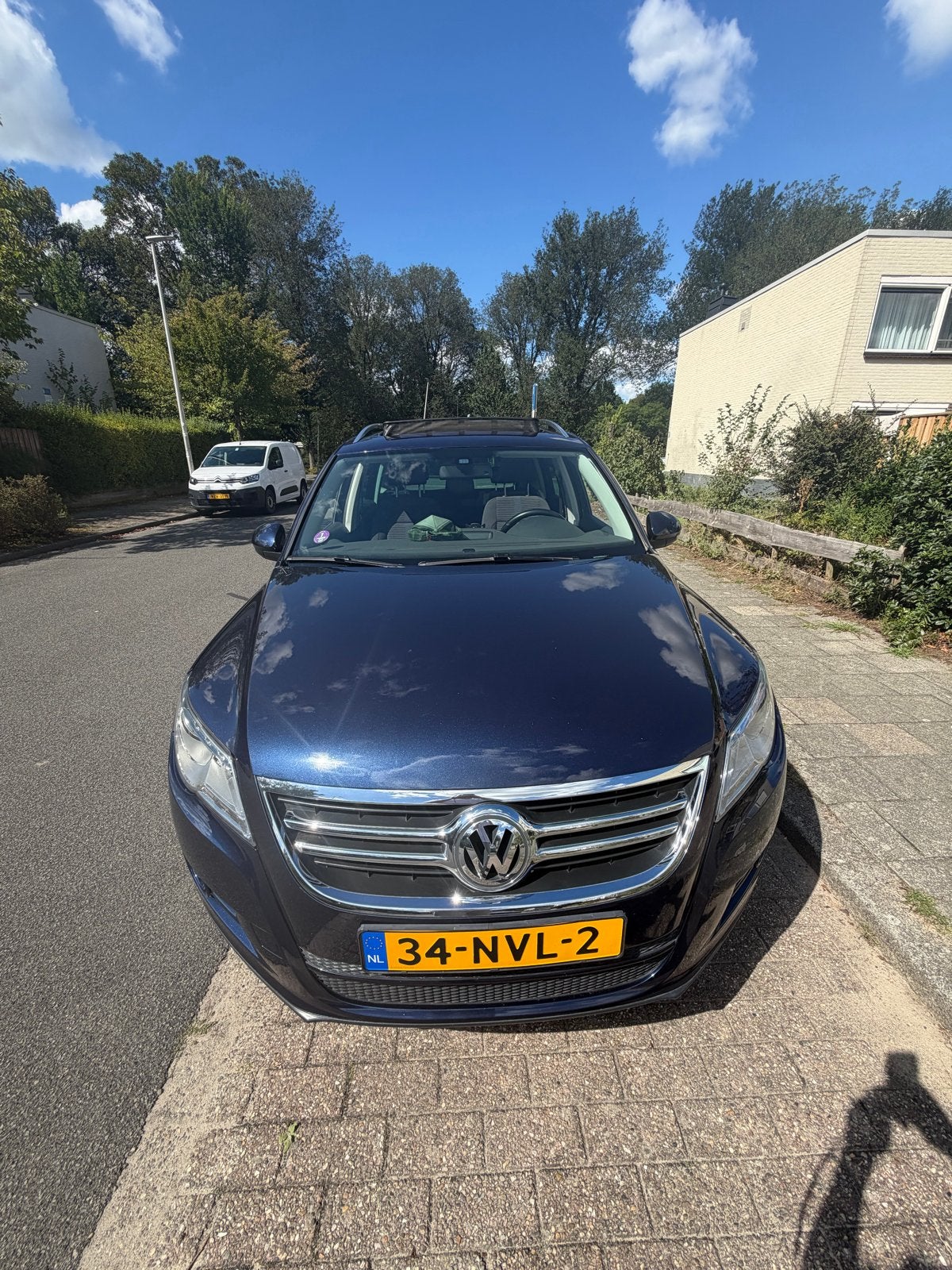 Volkswagen Tiguan 1.4 TSI 90KW BMT 2010 Blauw, Auto's, Voorwielaandrijving, Dealer onderhouden, Zwart, 4 cilinders