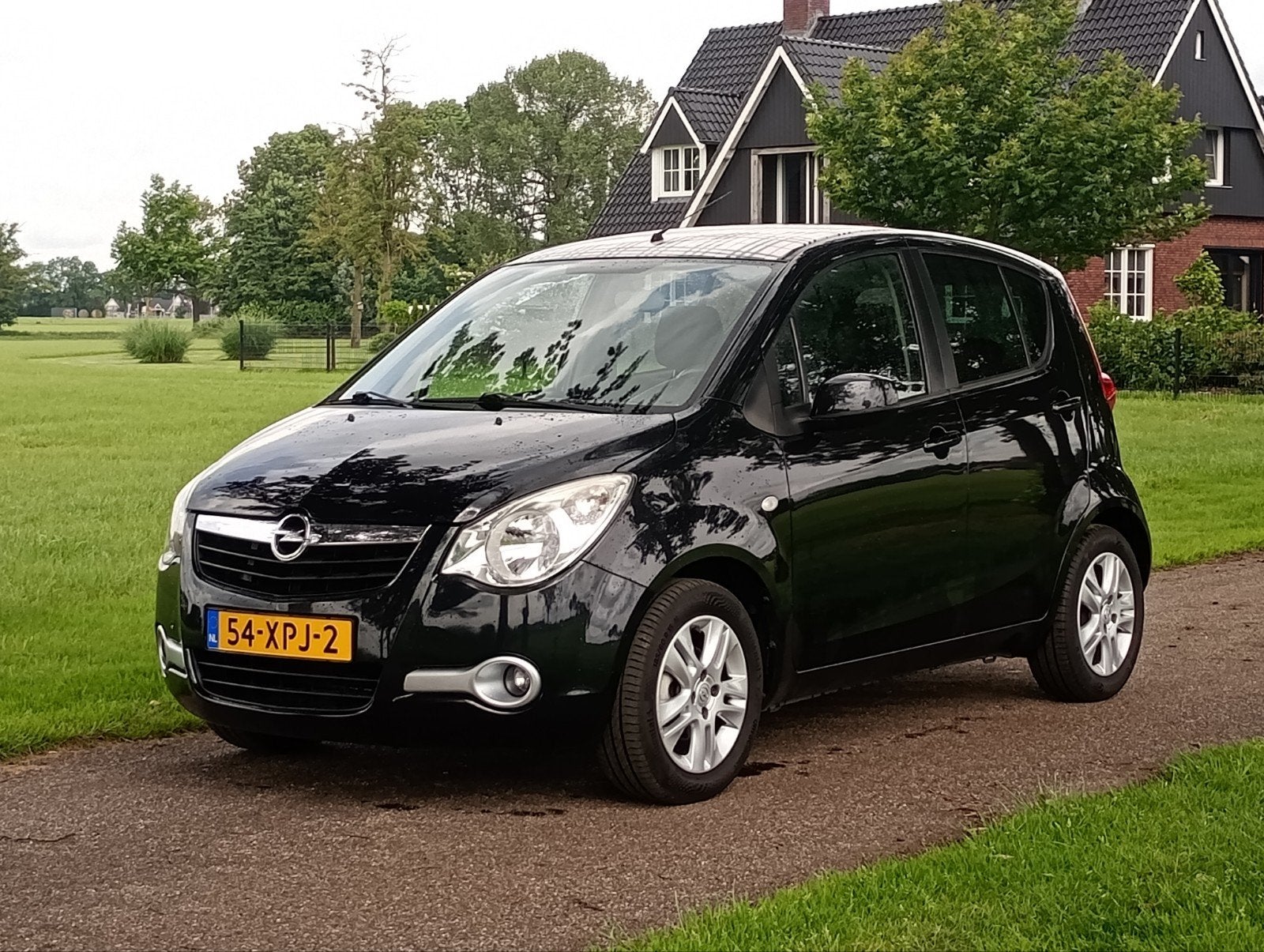 Opel Agila 1.0 12V 2012 Zwart Airco Lm velgen lage KM, Auto's, Opel, Euro 5, Stof, 31 €/maand, Origineel Nederlands