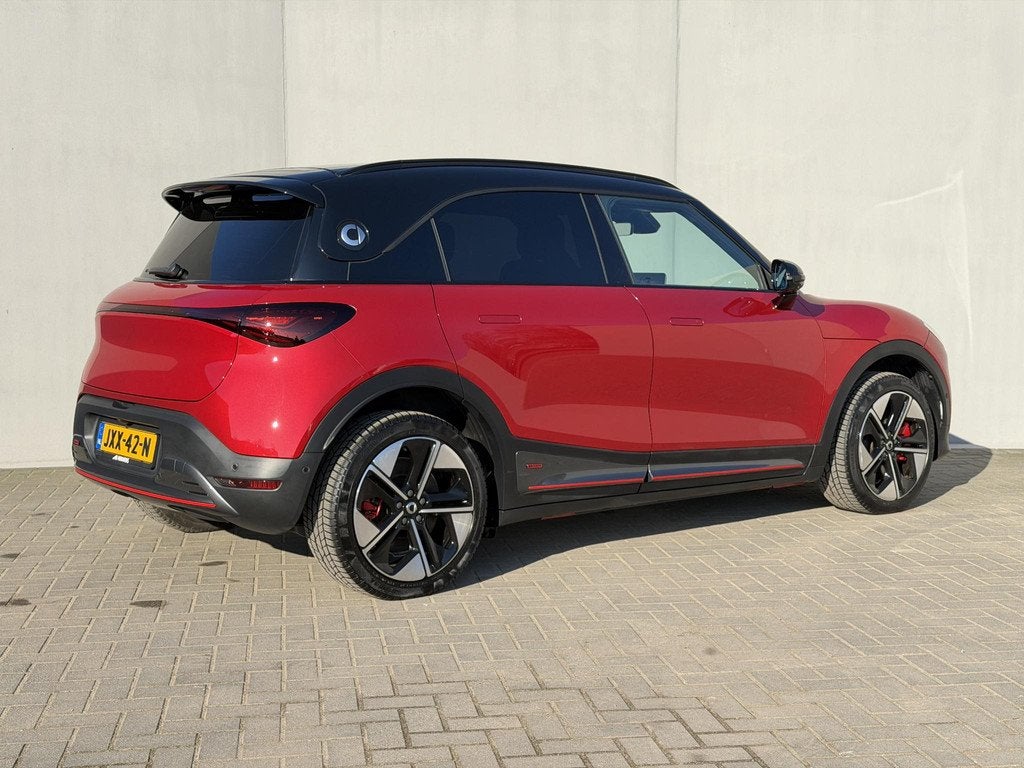 smart #1 BRABUS 66 kWh / 428 PK / SOH 99% / Panoramadak / 16, Auto's, Smart, Automaat, Gebruikt, Alcantara, 1875 kg