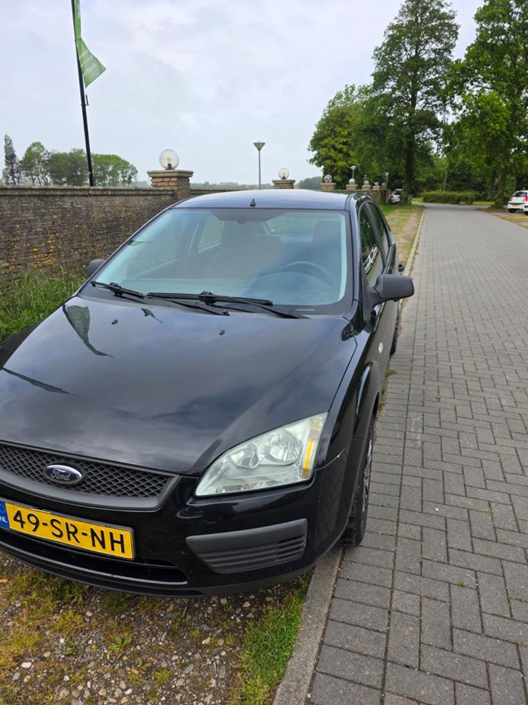 Ford Focus 1.4 59KW 5D 2006 Zwart, Auto's, Ford, 15 km/l, 1147 kg, 4 cilinders, 620 kg