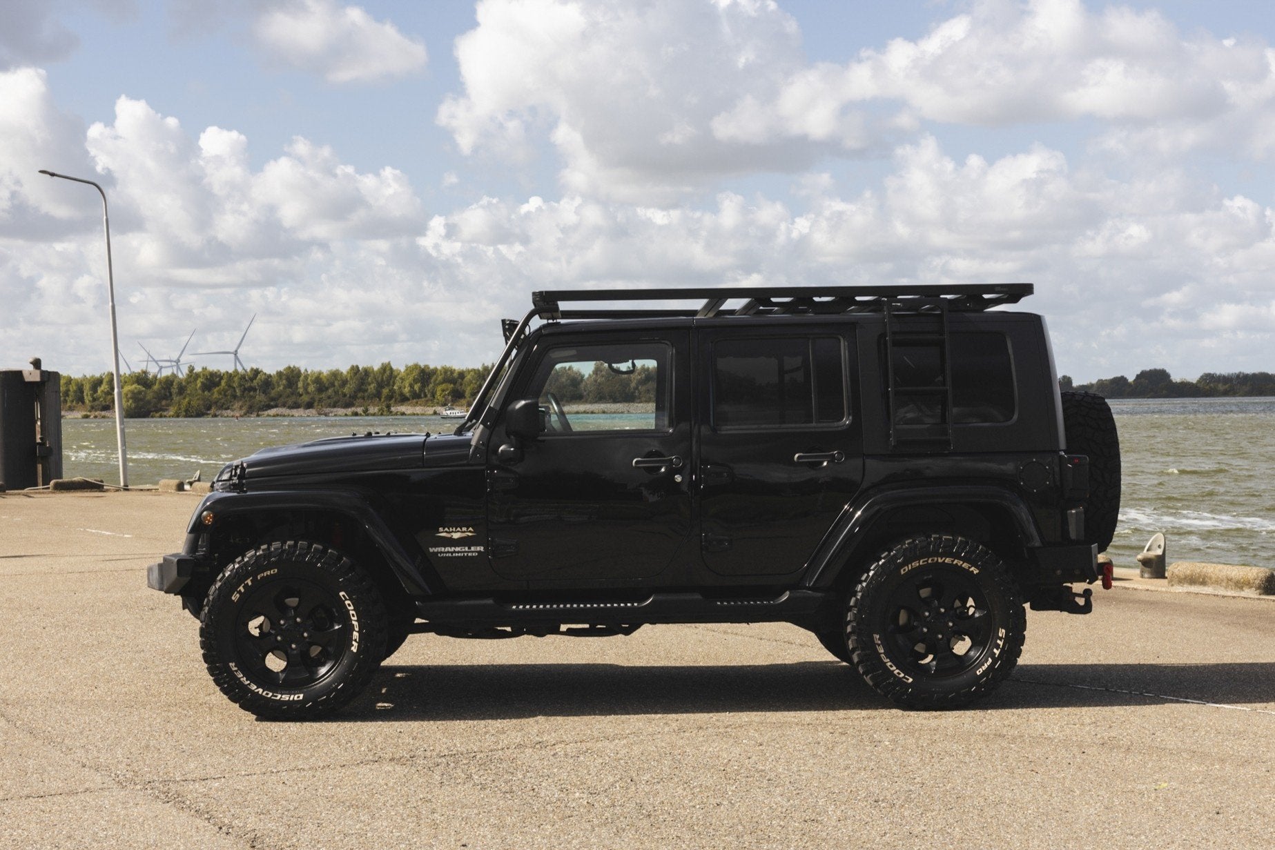 Jeep Wrangler Unlimited 2.8 CRD Sahara (bj 2009, automaat), Automaat, Gebruikt, 4 cilinders, Zwart