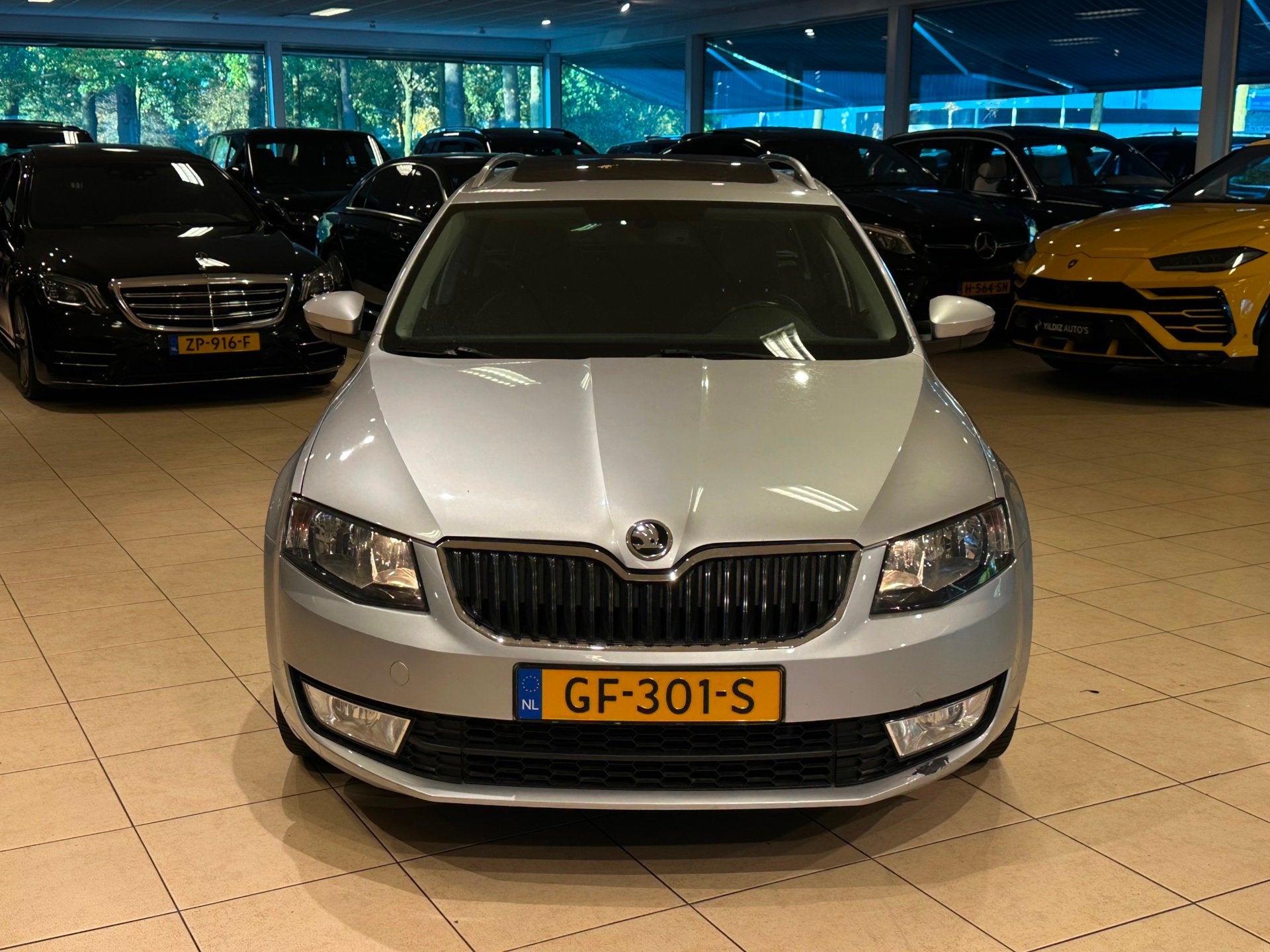 Skoda Octavia Combi 1.6 TDI Greentech Ambition|PANO|NAP|STOE, Voorwielaandrijving, Stof, Gebruikt, Zwart