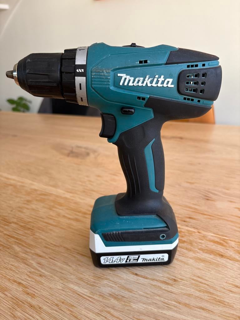 Makita DF347D Accuboormachine 14.4V, Variabele snelheid, Ophalen of Verzenden, Minder dan 400 watt, Zo goed als nieuw
