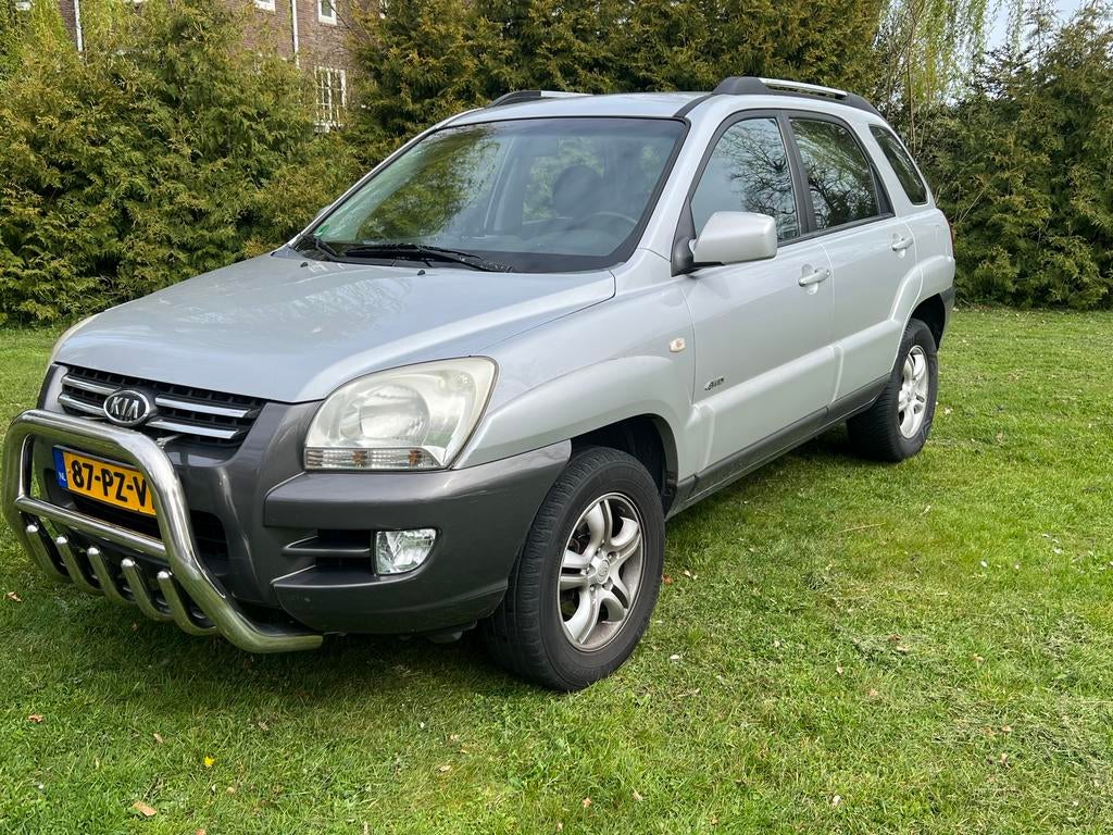 Kia Sportage 2.7 4WD AUT 2005 Grijs, Auto's, Kia, Automaat, Zwart, Parkeersensor, Vierwielaandrijving