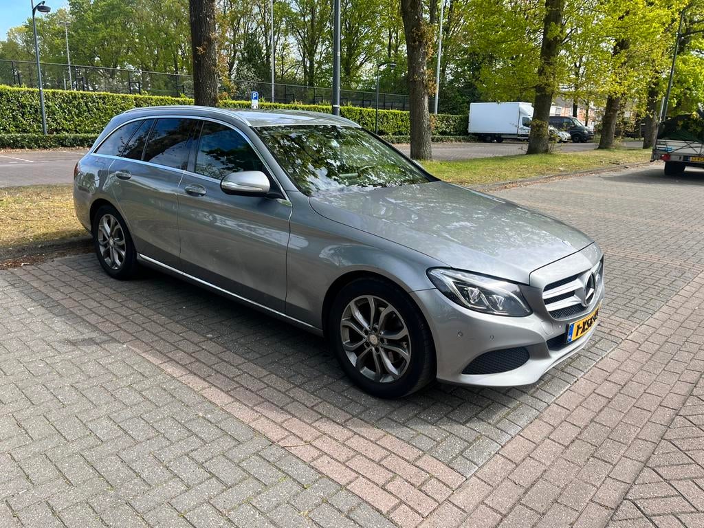 Mercedes-Benz C-Klasse C220d 2.1 125KW Estate 2014 Grijs, Auto's, Mercedes-Benz, 1800 kg, 4 cilinders, 23 km/l, Origineel Nederlands