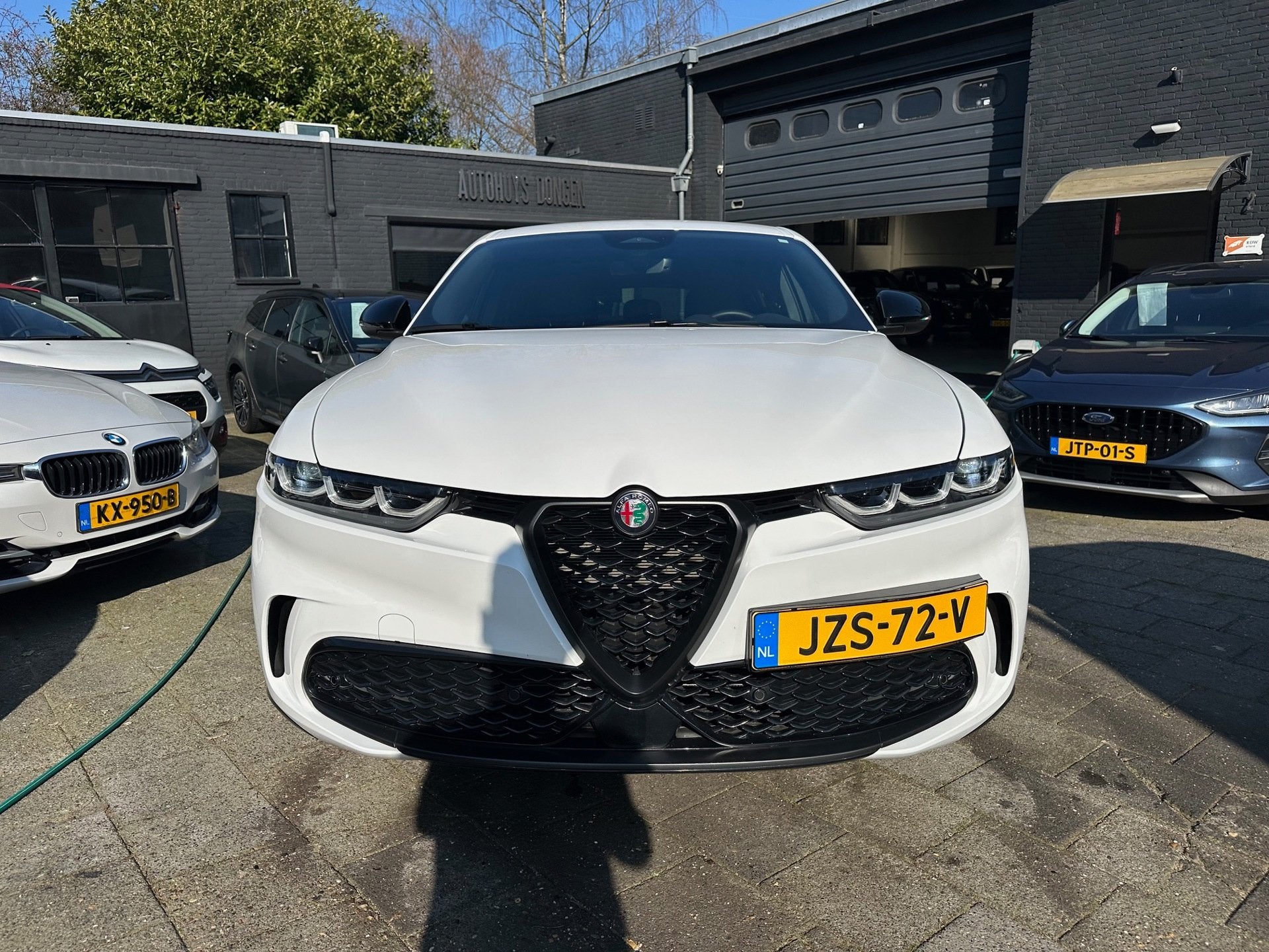 Alfa Romeo Tonale 160pk Hybrid Aut|16.000km|Leder|Fabrieksga, Auto's, Dealer onderhouden, Gebruikt, Zwart, 4 cilinders