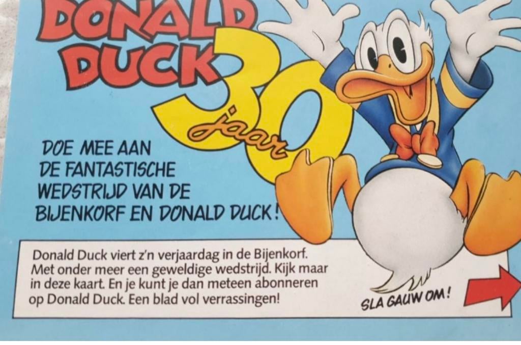Gezocht: Donald Duck reclame Bijenkorf, Boeken, Stripboeken, Ophalen of Verzenden