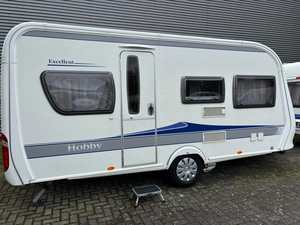 Hobby 455 UF met mover, unico luifel, nieuwe banden/accu, Caravans en Kamperen, Caravans, Mover, Rondzit, Hobby, Bedrijf