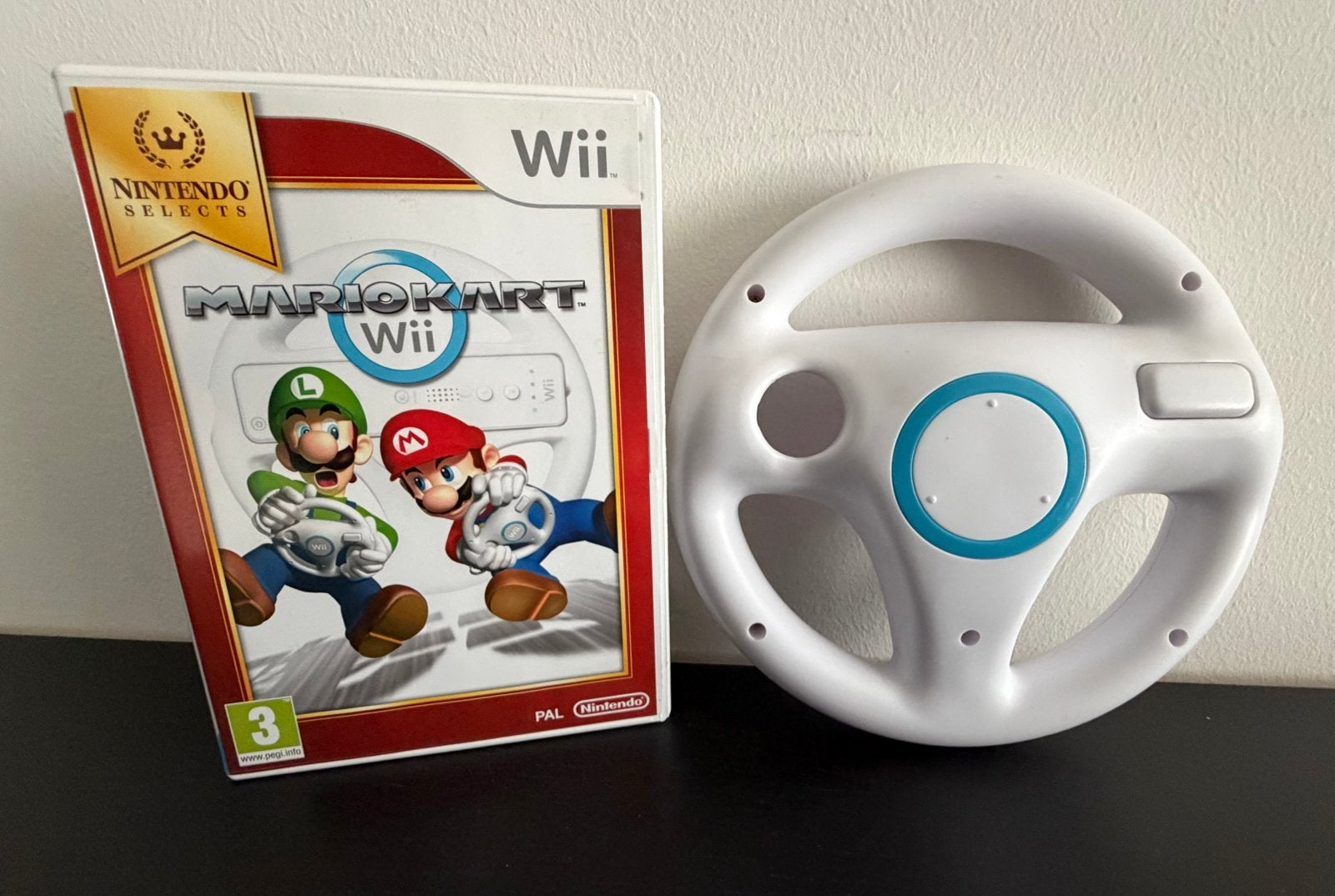 Mario Kart Wii - Compleet met stuur!, Spelcomputers en Games, Games | Nintendo Wii, Racen en Vliegen, Ophalen of Verzenden, Zo goed als nieuw