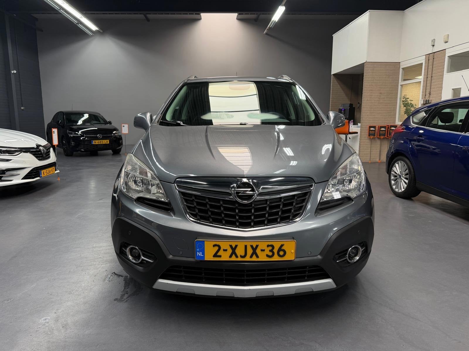 Opel Mokka 1.4 T Cosmo 1E EIGENAAR CAMERA LEDER TREKHAAK NAP, Auto's, Opel, Voorwielaandrijving, Euro 5, Gebruikt, 4 cilinders