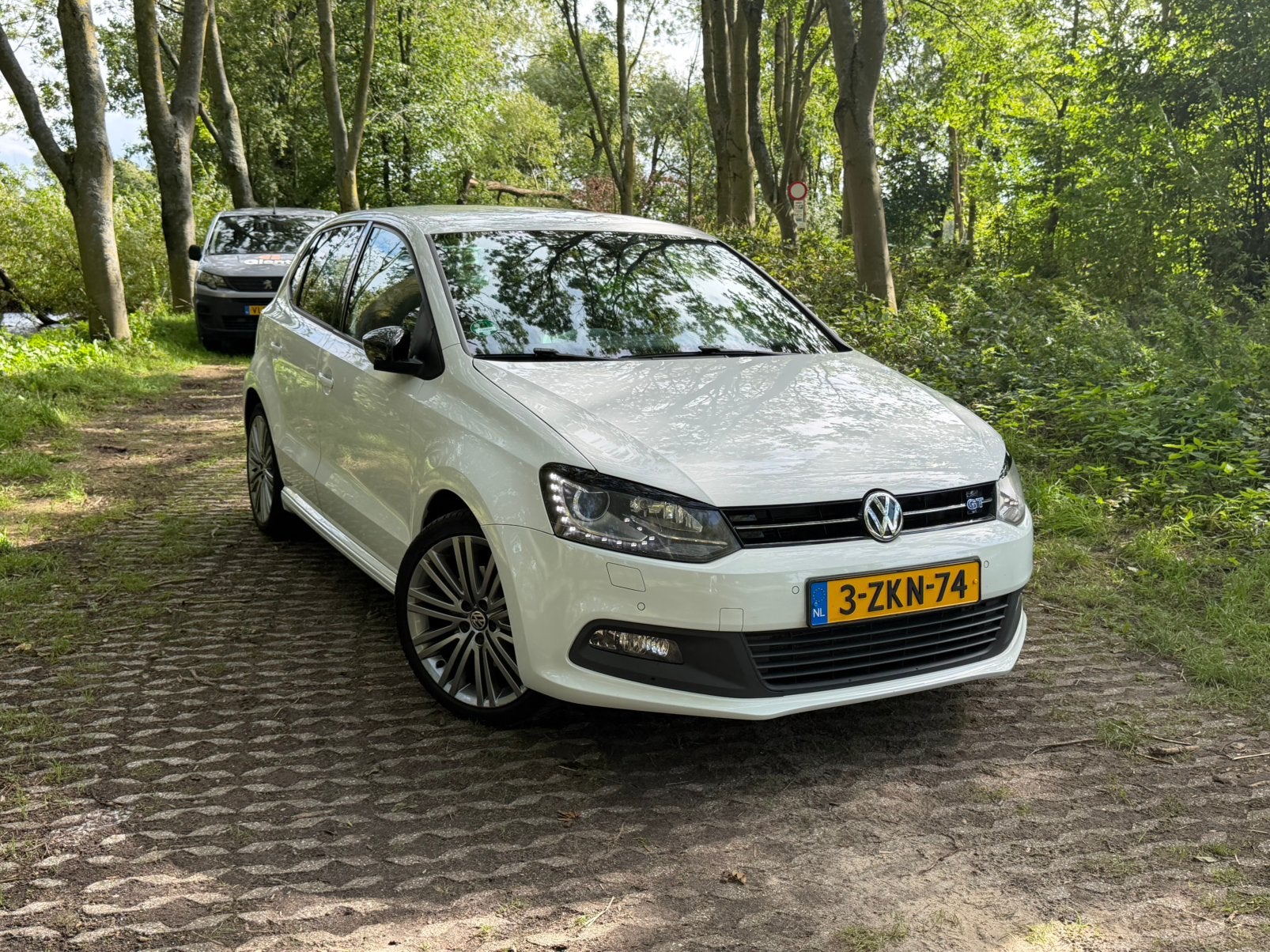 Volkswagen Polo 1.4 TSI BlueGT 150PK DSG 2015 Wit, Auto's, 4 cilinders, 150 pk, 610 kg, Origineel Nederlands
