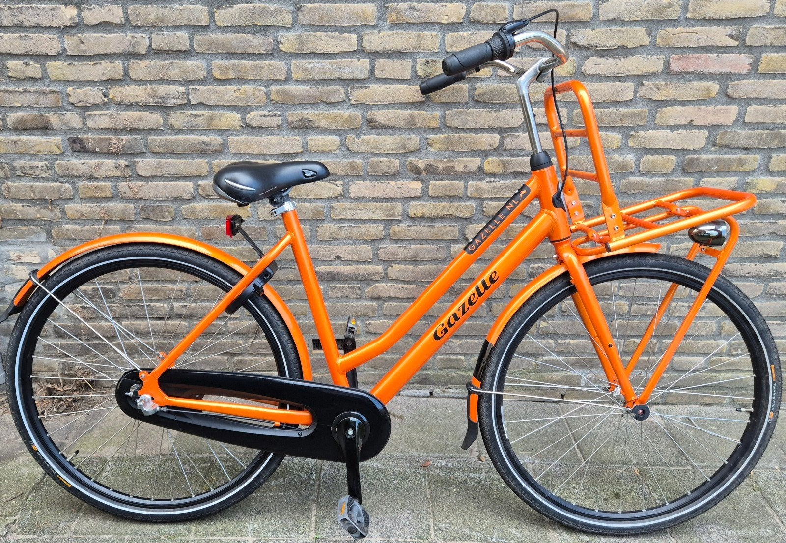 te koop gazelle NL oranje damesfiets in super nette staat, Fietsen en Brommers, Fietsen | Dames | Damesfietsen, Ophalen, Terugtraprem