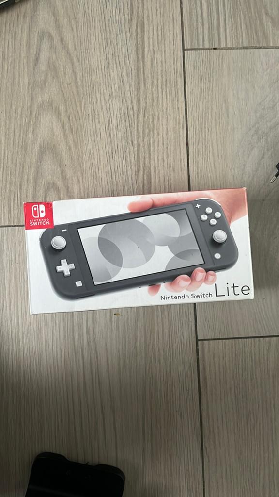 Switch Lite, Ophalen of Verzenden, Zo goed als nieuw, Zonder controller, Switch Original