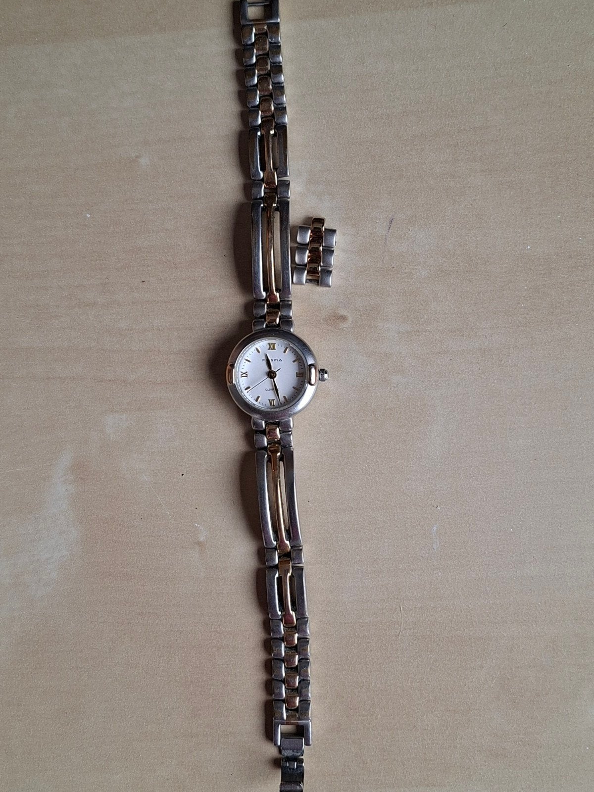 Prisma quartz dameshorloge met metalen band, Ophalen of Verzenden, Gebruikt, Staal, Overige merken