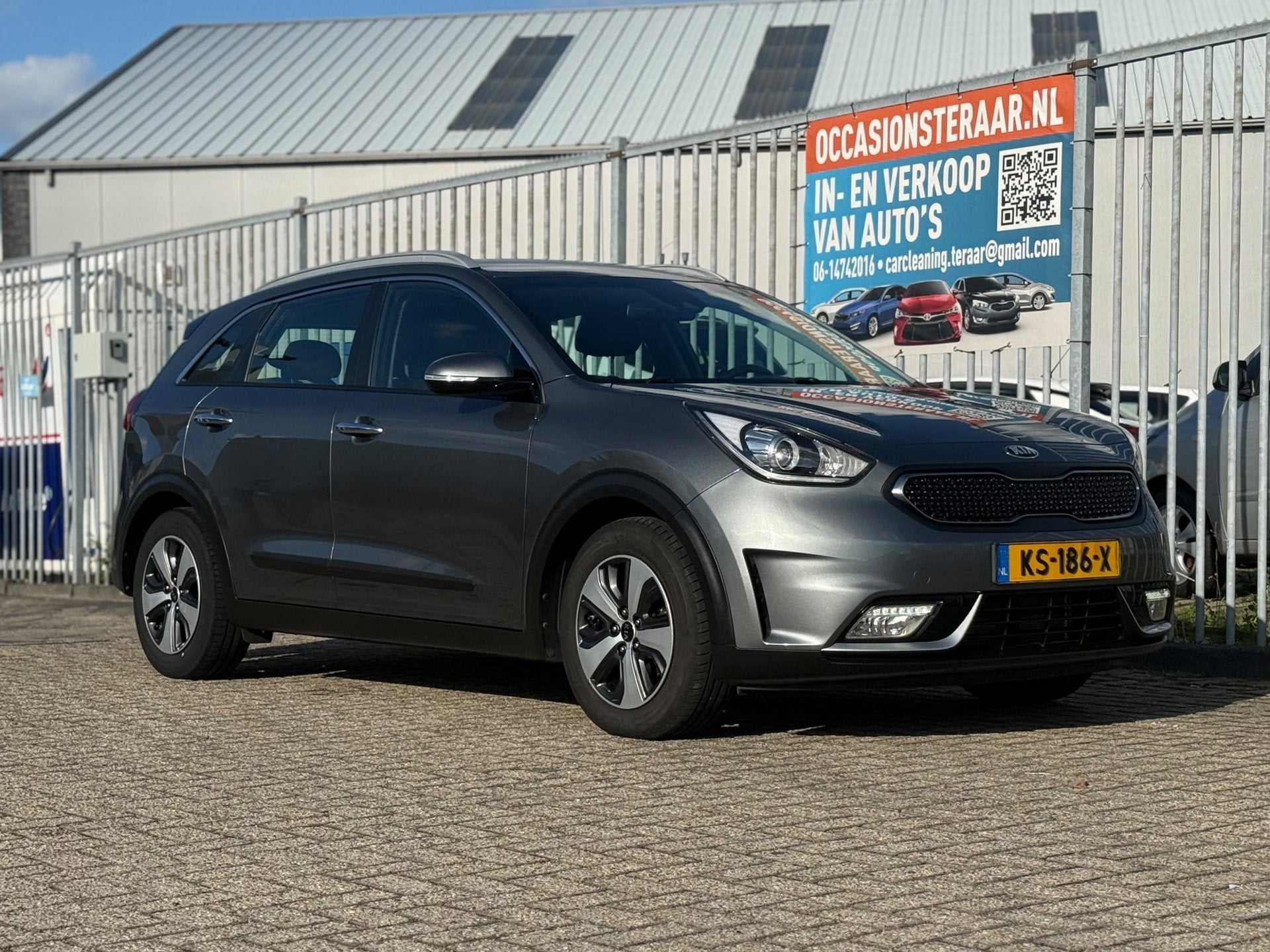 Kia Niro 1.6 GDi Hybrid First Edition#Nap#Aut#Trekhk, Auto's, Gebruikt, 26 km/l, SUV of Terreinwagen, Zilver of Grijs