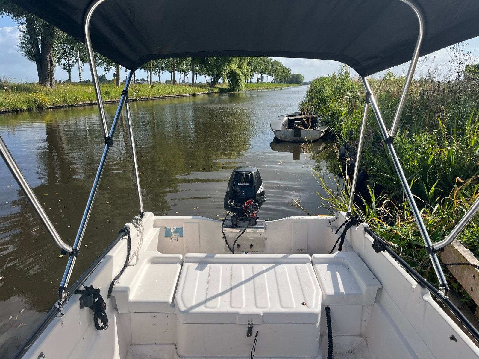 Stabiele polyester boot met buitenboordmotor en biminitop, Watersport en Boten, Motorboten en Motorjachten, Overige merken, Gebruikt