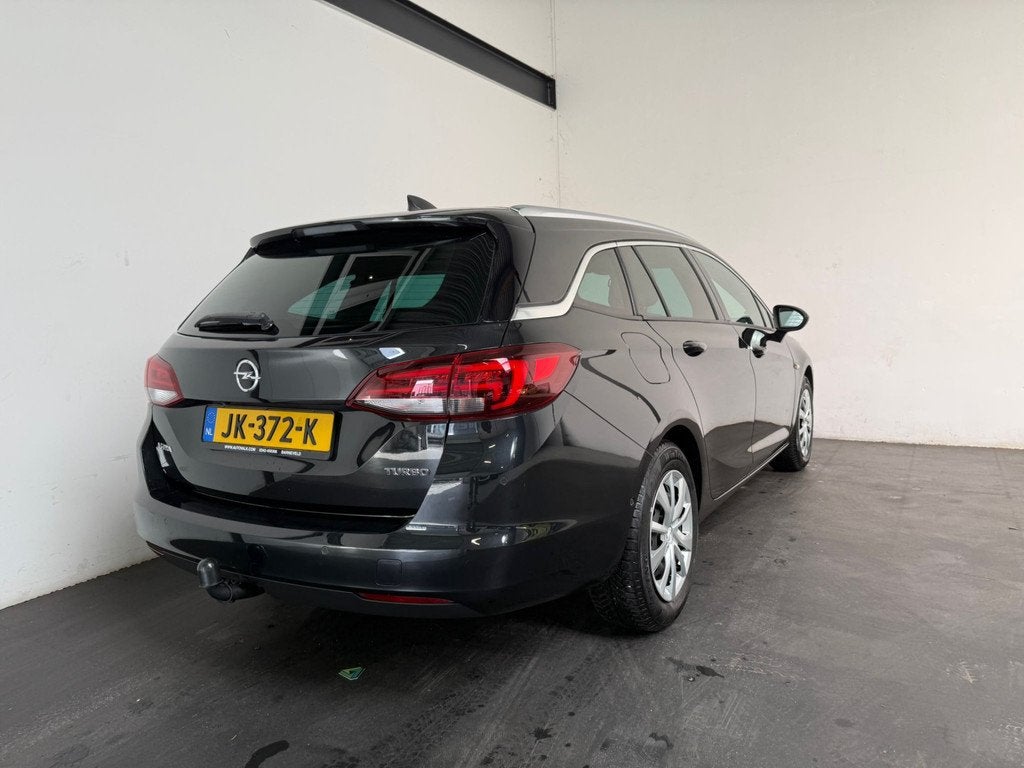 Opel Astra Sports Tourer 1.4 Innovation. Trekhaak!, Auto's, Voorwielaandrijving, Gebruikt, 4 cilinders, Zwart