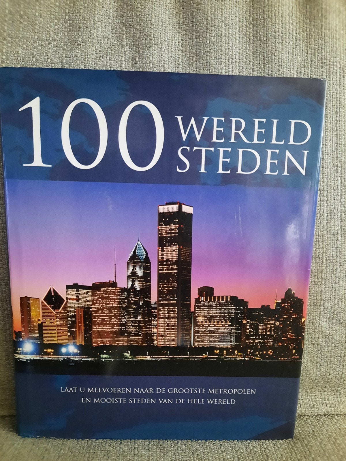 Boek '100 wereldsteden', Ophalen of Verzenden, Zo goed als nieuw, Overige onderwerpen