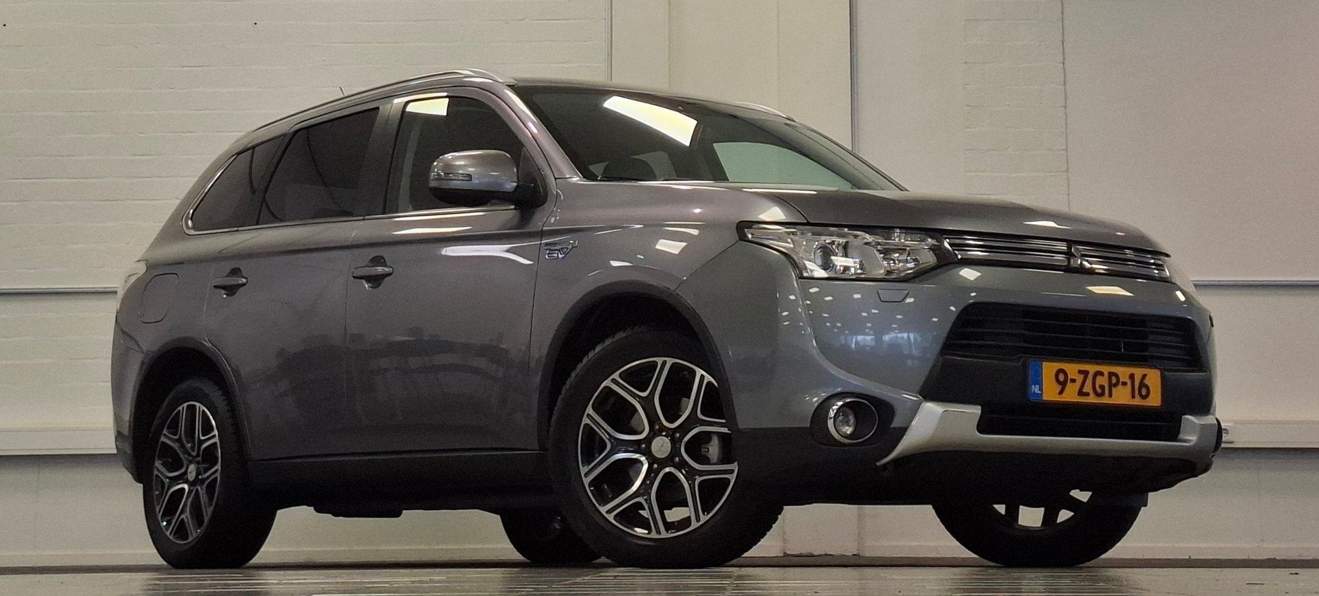 Mitsubishi Outlander 2.0 PHEV Executive X-Line 100% Onderhou, Auto's, Zwart, 4 cilinders, Leder en Stof, Bedrijf